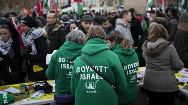Demonstrators advocating the movement to boycott, divest from and sanction Israel, known as BDS, gather for a protest last year in Paris. On Thursday, U.S. Secretary of State Mike Pompeo announced a new policy specifically countering the global BDS campaign.