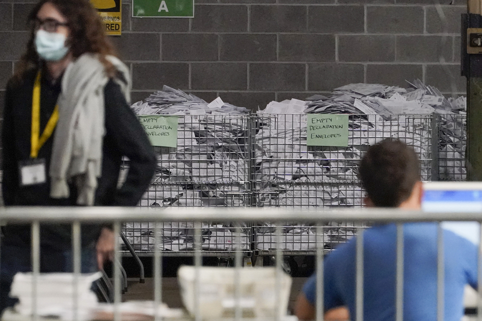 Election office workers process ballots at the Allegheny County elections returns warehouse in Pittsburgh, earlier this month. (Gene J. Puskar/AP)