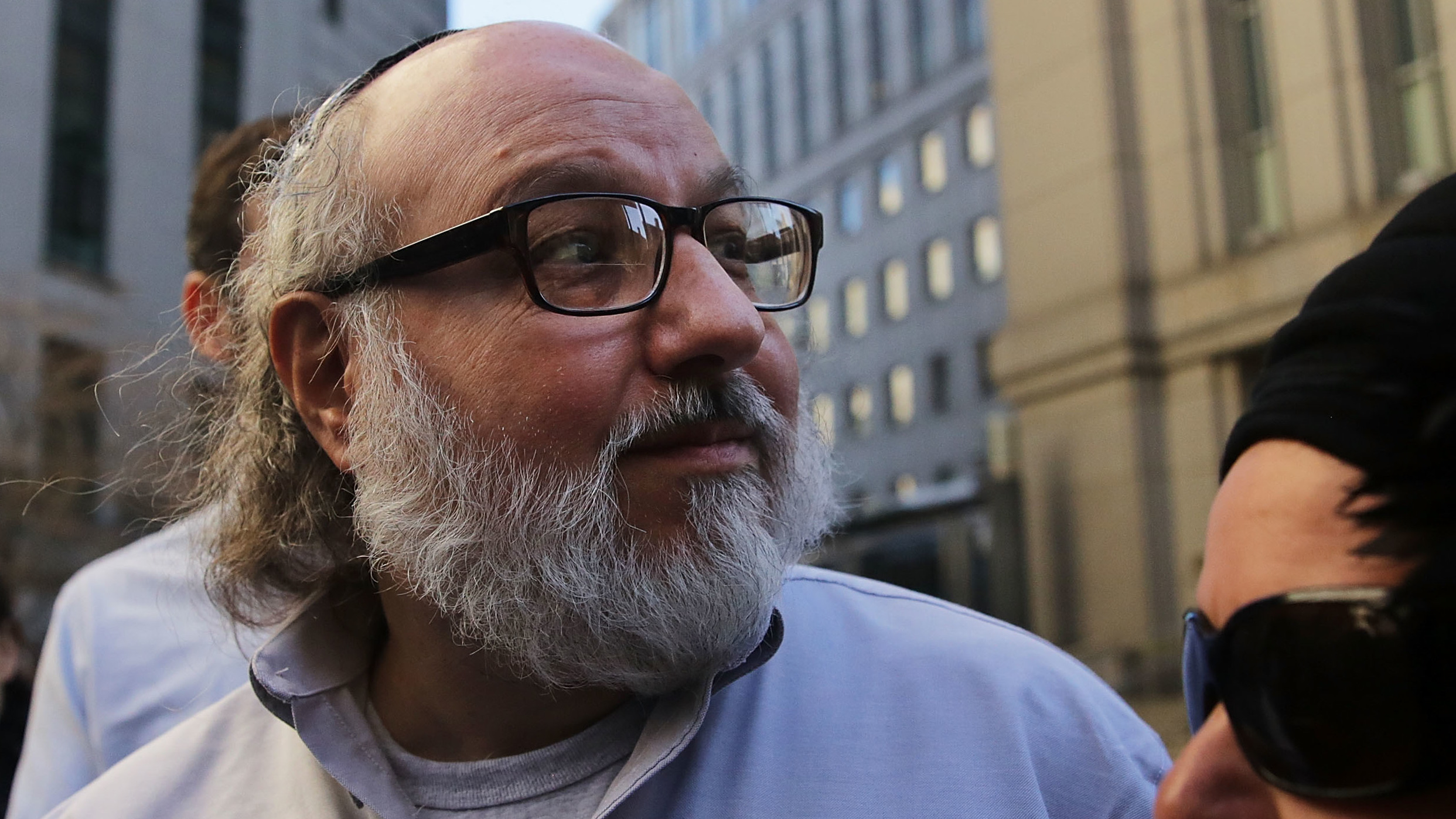 Jonathan Pollard, the American convicted of spying for Israel, leaves a New York courthouse following his release from prison in 2015. As of Friday, Pollard has completed the terms of his parole and is a free man.