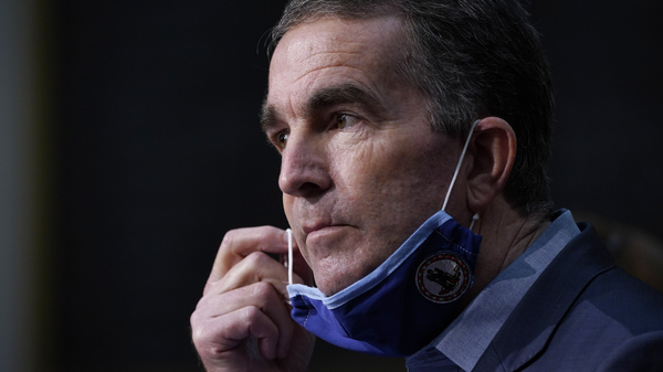 Virginia Gov. Ralph Northam gives a COVID-19 briefing at the Capitol in Richmond on Wednesday. Many governors are urging Americans to stay home for Thanksgiving.