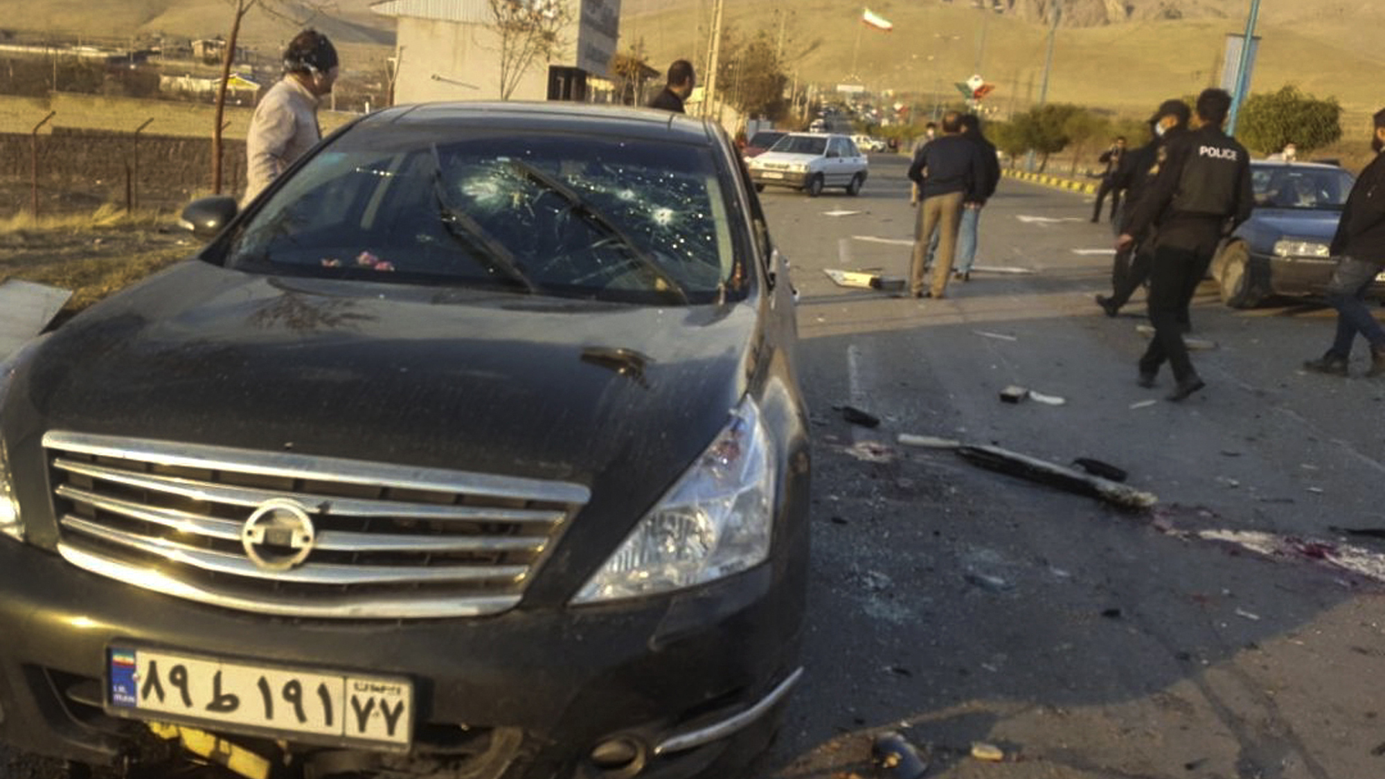 This photo released by the semiofficial Fars News Agency shows the scene where Mohsen Fakhrizadeh was reportedly killed in Absard, a small city just east of Tehran, Iran, on Friday. Fakhrizadeh, an Iranian scientist that Israel alleged led the Islamic Republic