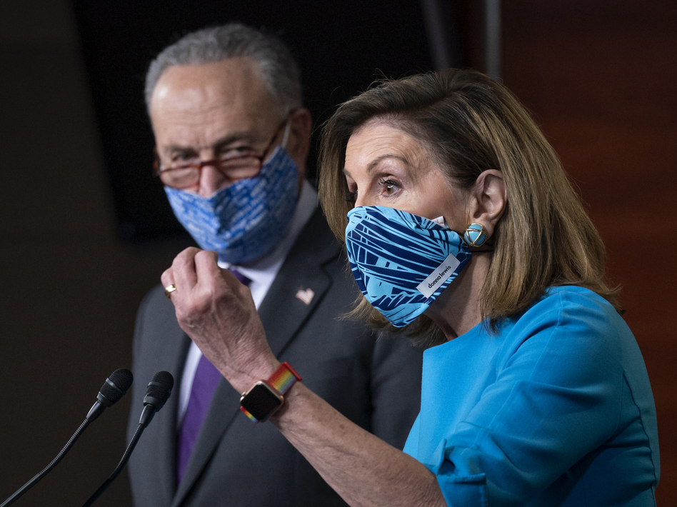 House Speaker Nancy Pelosi, D-Calif., and Senate Minority Leader Chuck Schumer, D-N.Y., are breaking from their demand for more than $2 trillion in coronavirus relief spending to move toward a compromise. (J. Scott Applewhite/AP)