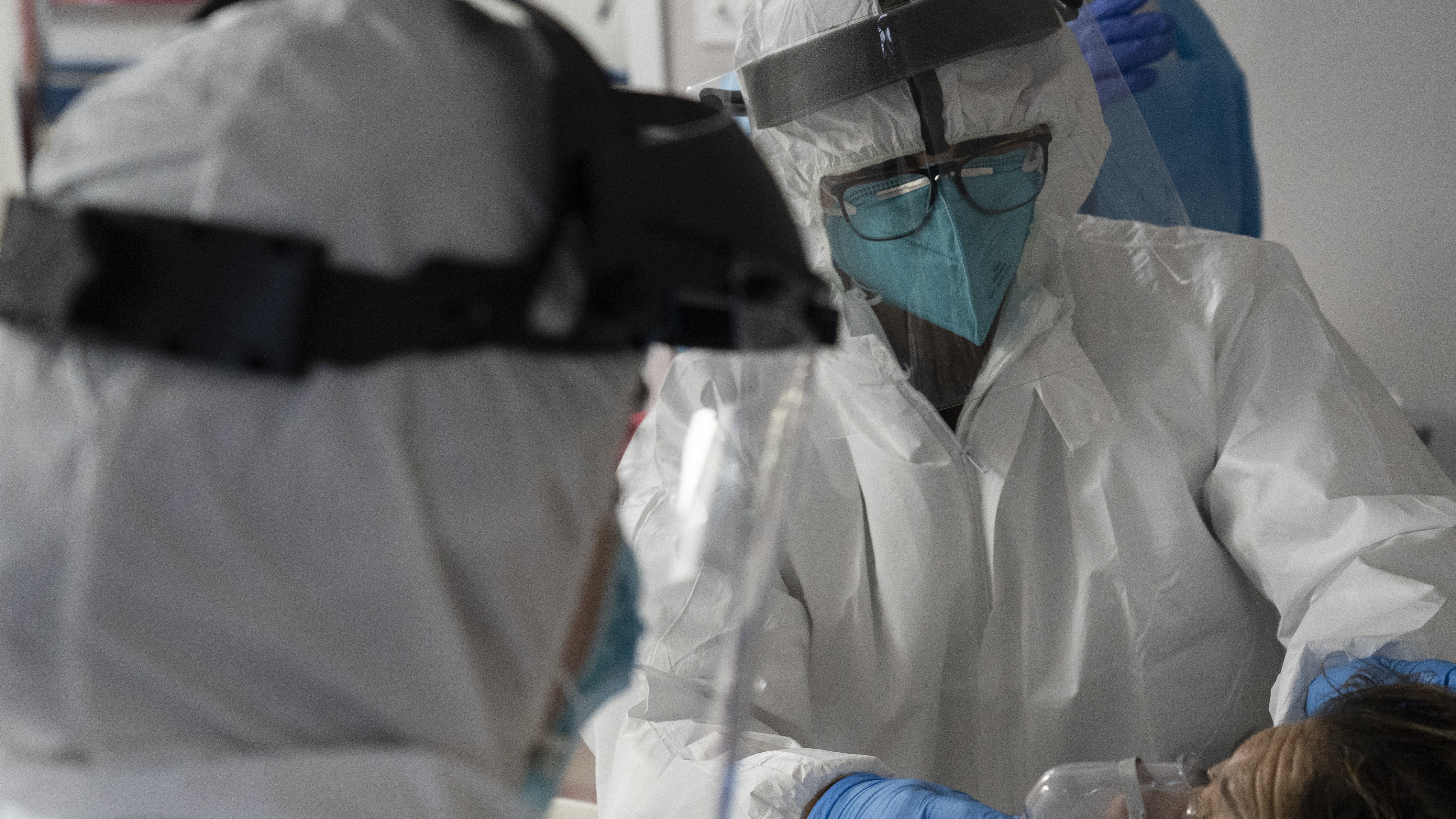 The U.S. hit a record high coronavirus hospitalization rate Wednesday, putting further strain on the nation