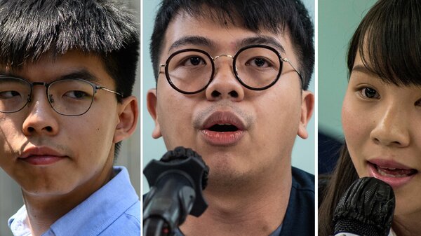 File photos shows Hong Kong pro-democracy activist Joshua Wong, left, activist Ivan Lam (center) and then-student activist Agnes Chow. The three were sentenced in Hong Kong on Wednesday for their roles in leading last year