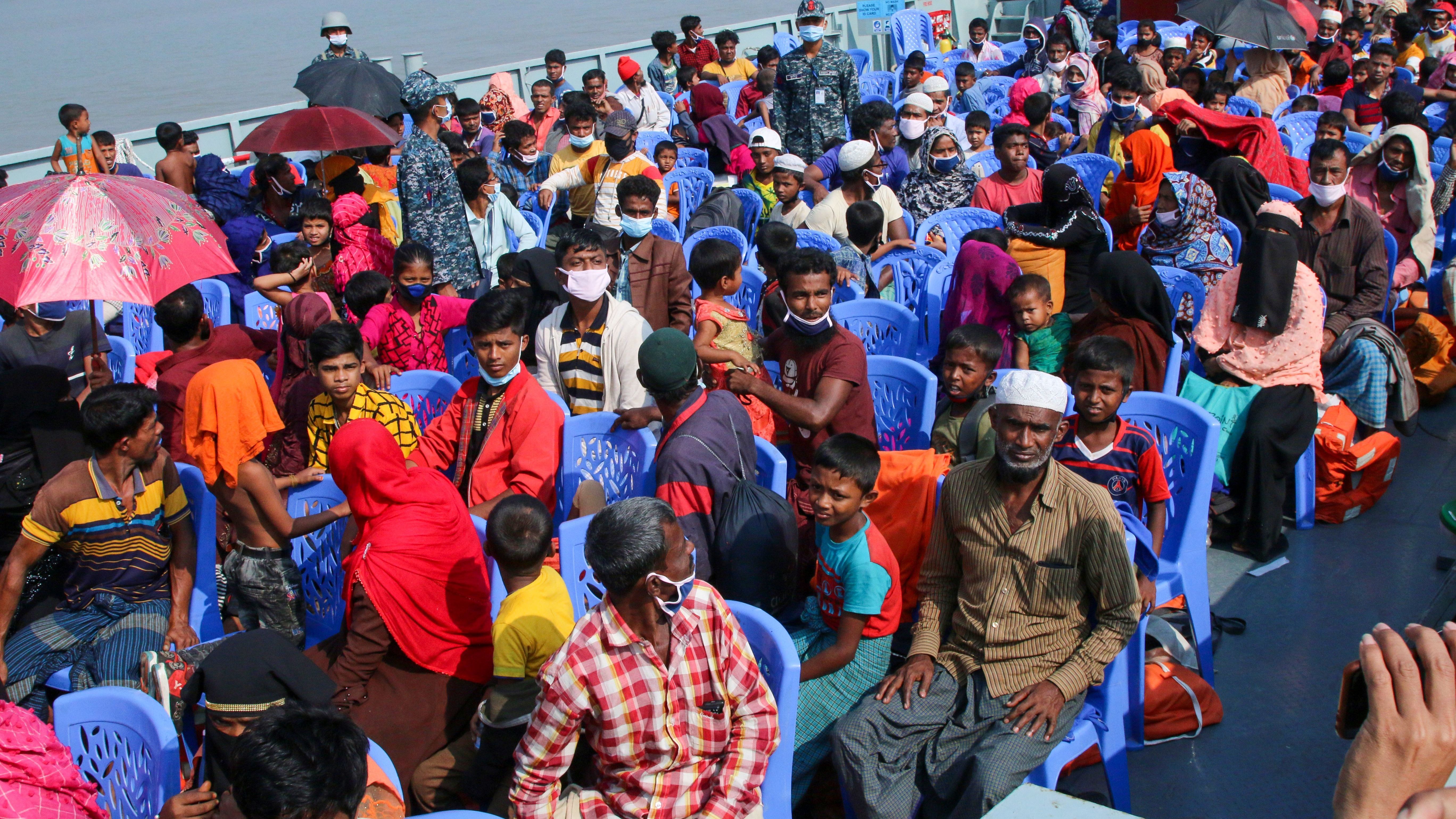 Bangladesh began transporting Rohingya refugees by boat to the island of Bhashan Char, with rights groups alleging people were being misled into leaving.