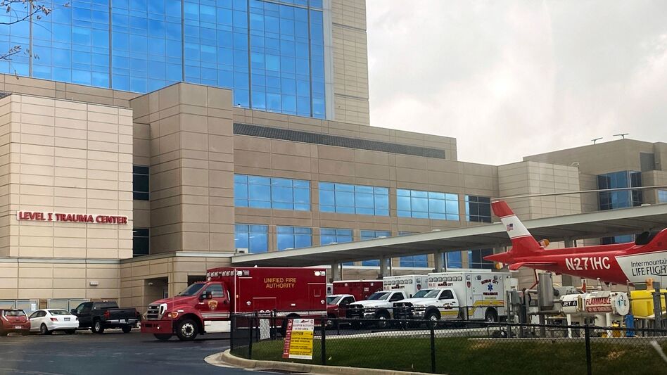 Ambulances line up at the entrance of the emergency room to drop off patients at Intermountain Medical Center in Murray, Utah, on Nov. 11. (AFP via Getty Images)