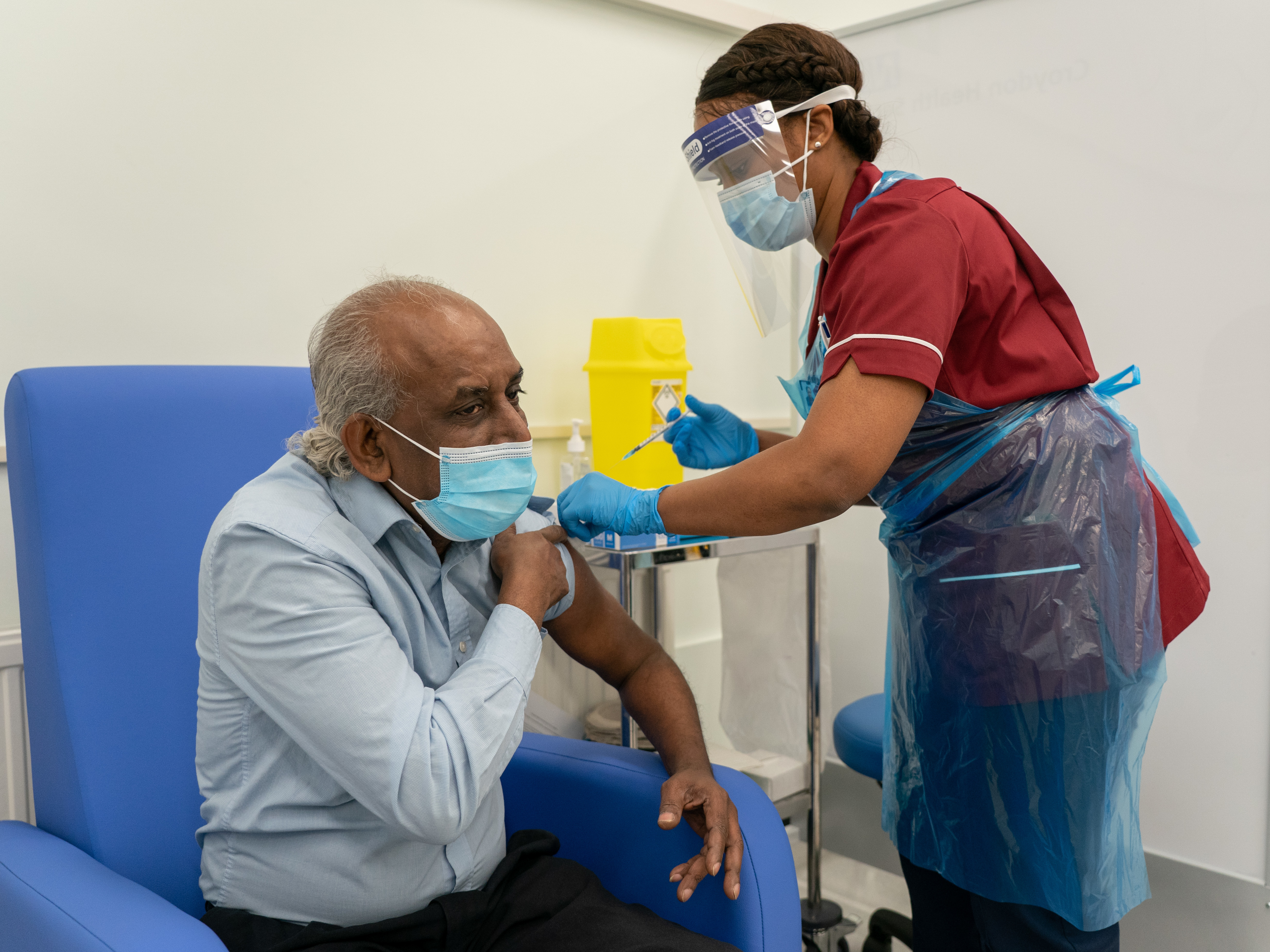 A nurse prepares to administer a COVID-19 vaccine at Croydon University Hospital in London. (Getty Images)