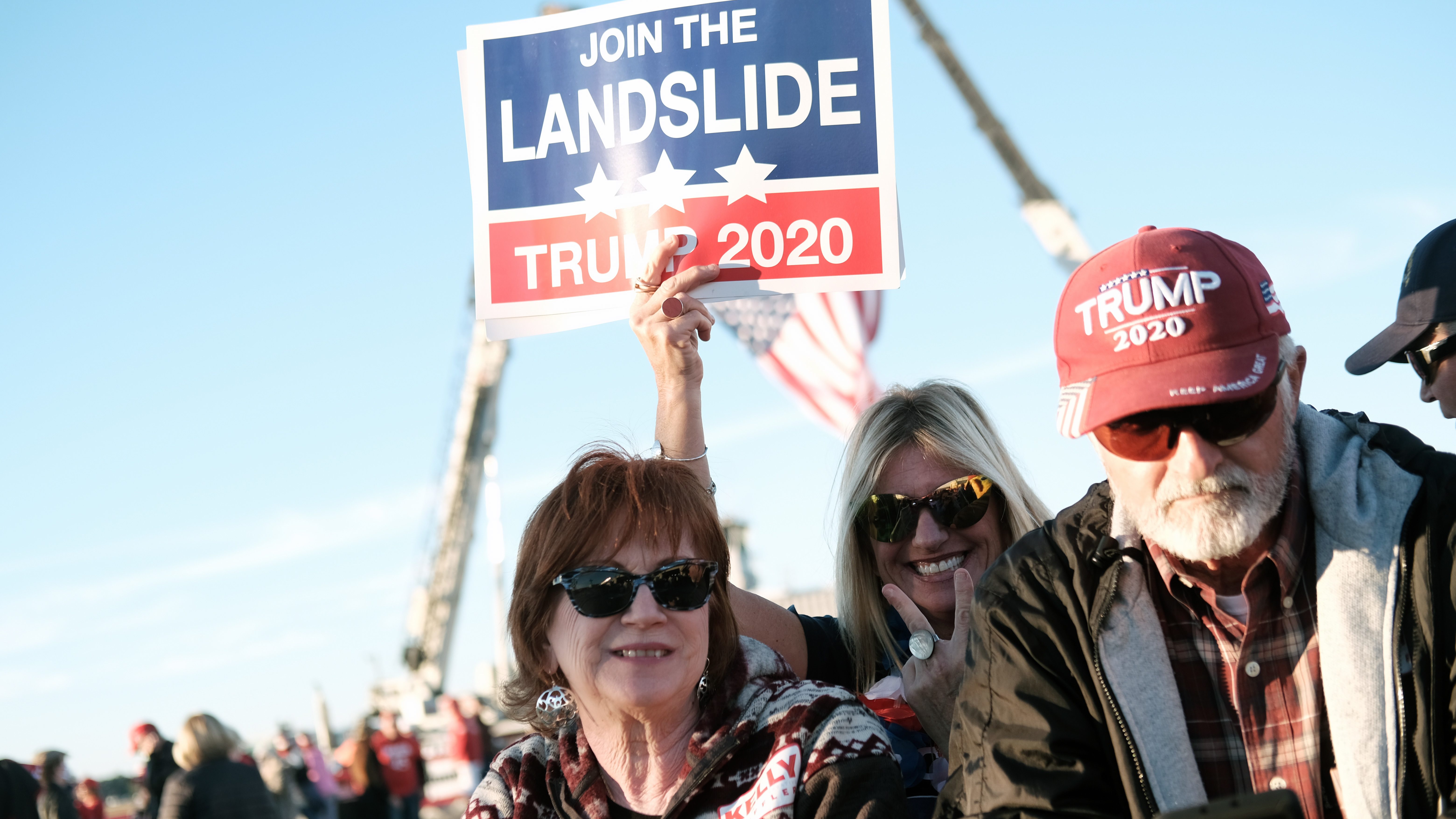 Supporters arrive for a President Trump rally in Valdosta, Ga., last weekend. Fewer than half of Trump backers said they would get the COVID-19 vaccine in a new poll. (Getty Images)