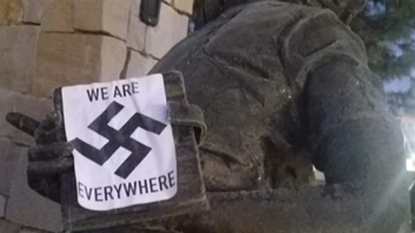 A swastika sticker on a statue at the Idaho Anne Frank Human Rights Memorial in Boise, Idaho. The vandalism took place sometime between Monday evening and Tuesday morning, Boise Police said.