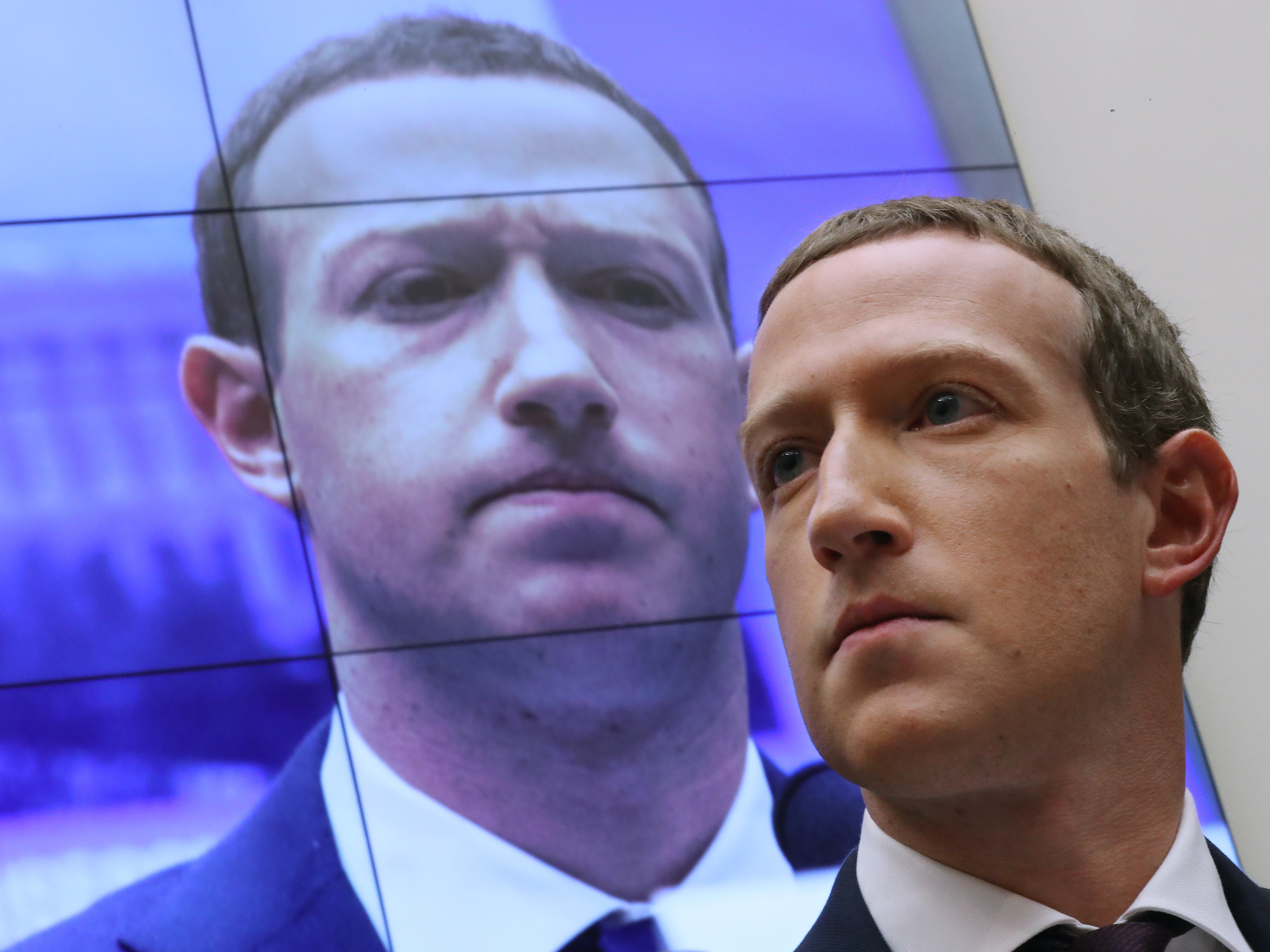 Facebook CEO Mark Zuckerberg testifies before the House Financial Services Committee in 2019. His company has been hit with twin lawsuits alleging it abused its power in order to crush rivals. (Getty Images)