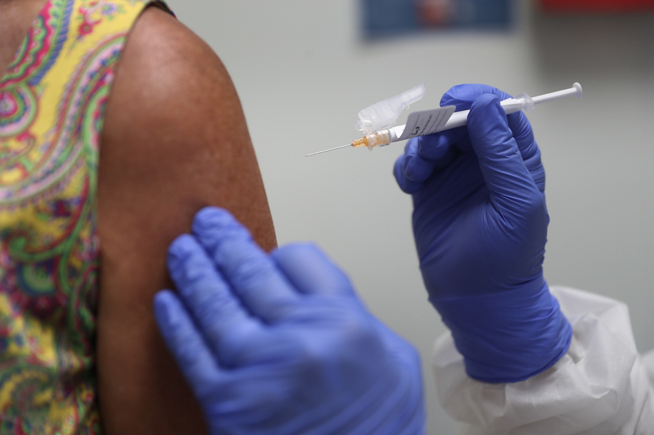 Lisa Taylor got a COVID-19 vaccination in August as part of a vaccine study at Research Centers of America in Hollywood, Fla. (Joe Raedle/Getty Images)