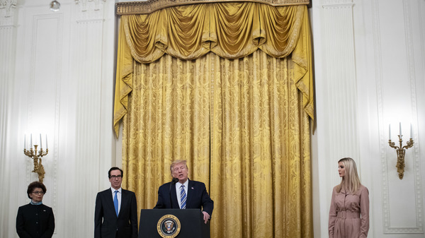 President Trump speaks as Jovita Carranza, administrator of the Small Business Administration; Treasury Secretary Steven Mnuchin; and Ivanka Trump, advisor to the president, listen during a Paycheck Protection Program event in the East Room of the White House on April 28, 2020.