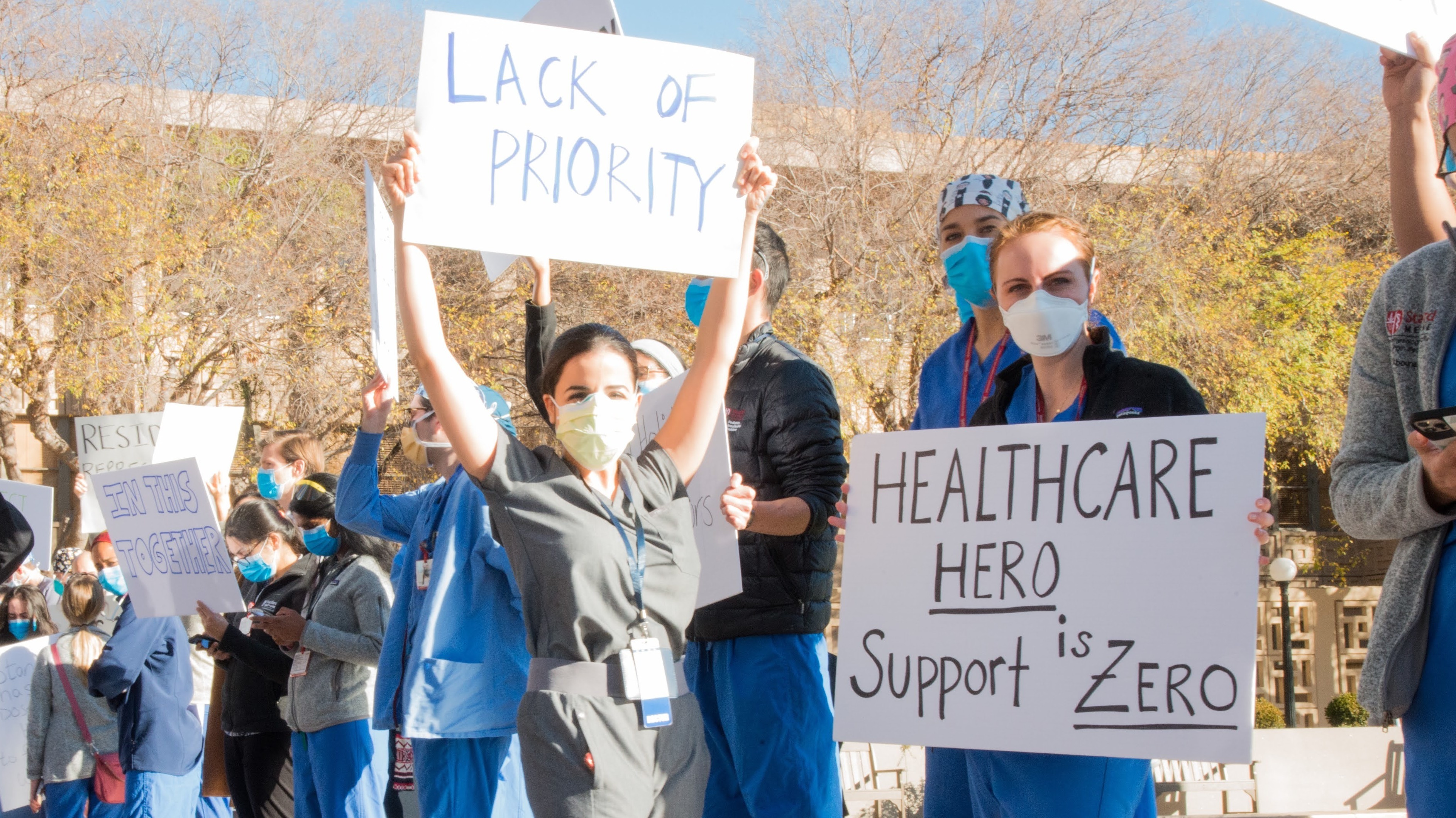 Medical residents and fellows protest the university