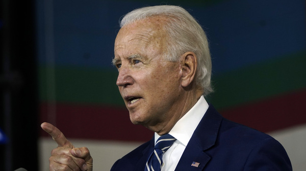 Joe Biden speaks about economic recovery during a campaign event at Colonial Early Education Program at the Colwyck Center, in July. In an interview with Stephen Colbert, the president-elect defended his son, Hunter, whose tax affairs are under investigation.