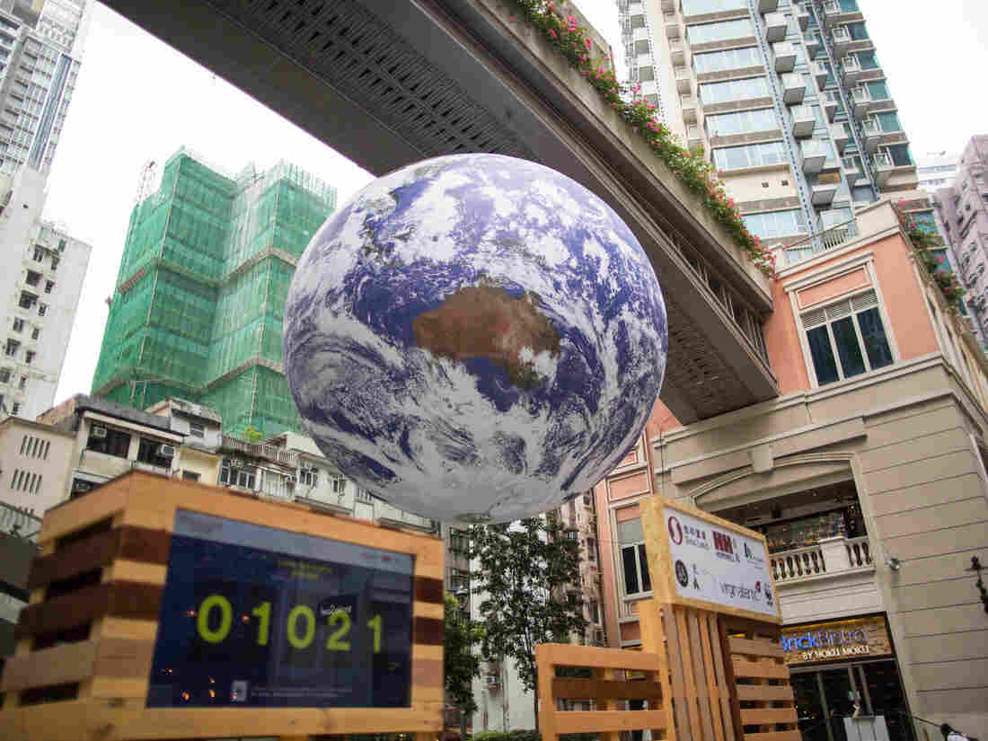 HONG KONG, CHINA - 2019/03/30: Earth Globe 'Gaia' by artist Luke Jerram set up to raise awareness about global warming seen in the Wan Chai district of Hong Kong Island. (Photo by Guillaume Payen/SOPA Images/LightRocket via Getty Images)
