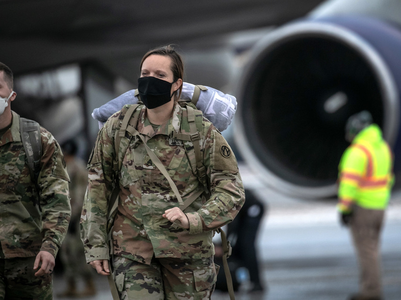 U.S. Army soldiers return from deployment to Afghanistan earlier this month at Fort Drum, N.Y. (John Moore/Getty Images)