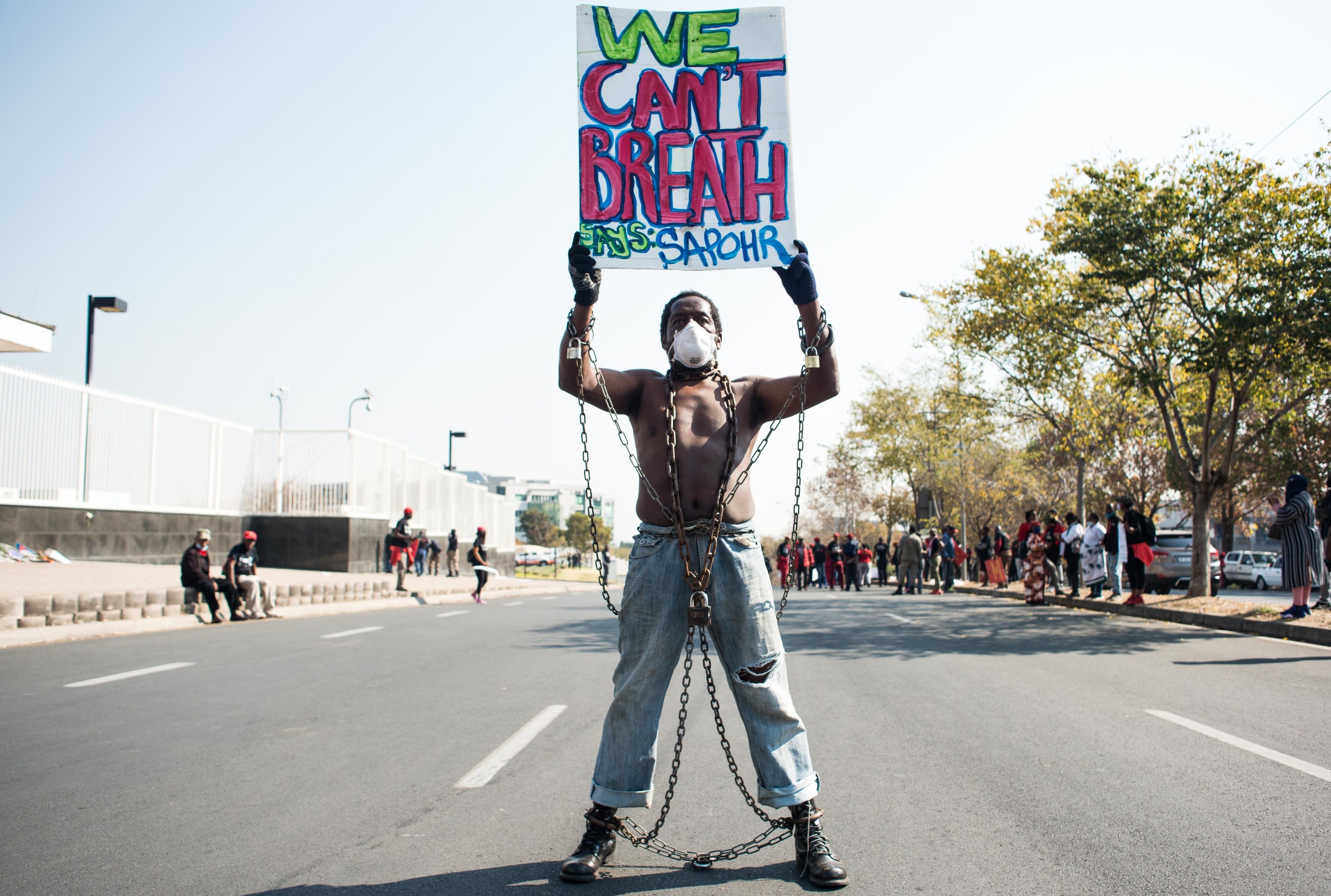 Members of Economic Freedom Fighters (EFF) protest against the death of George Floyd outside U.S. Consulate in solidarity with Black Lives Matter movement on June 8, 2020 in Sandton, South Africa. (Gallo Images via Getty Images)