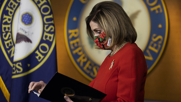 Speaker of the House Nancy Pelosi, D-Calif., holds a press conference on Sunday. Congress is scrambling after President Trump blasted a major aid and spending package that lawmakers passed Monday.