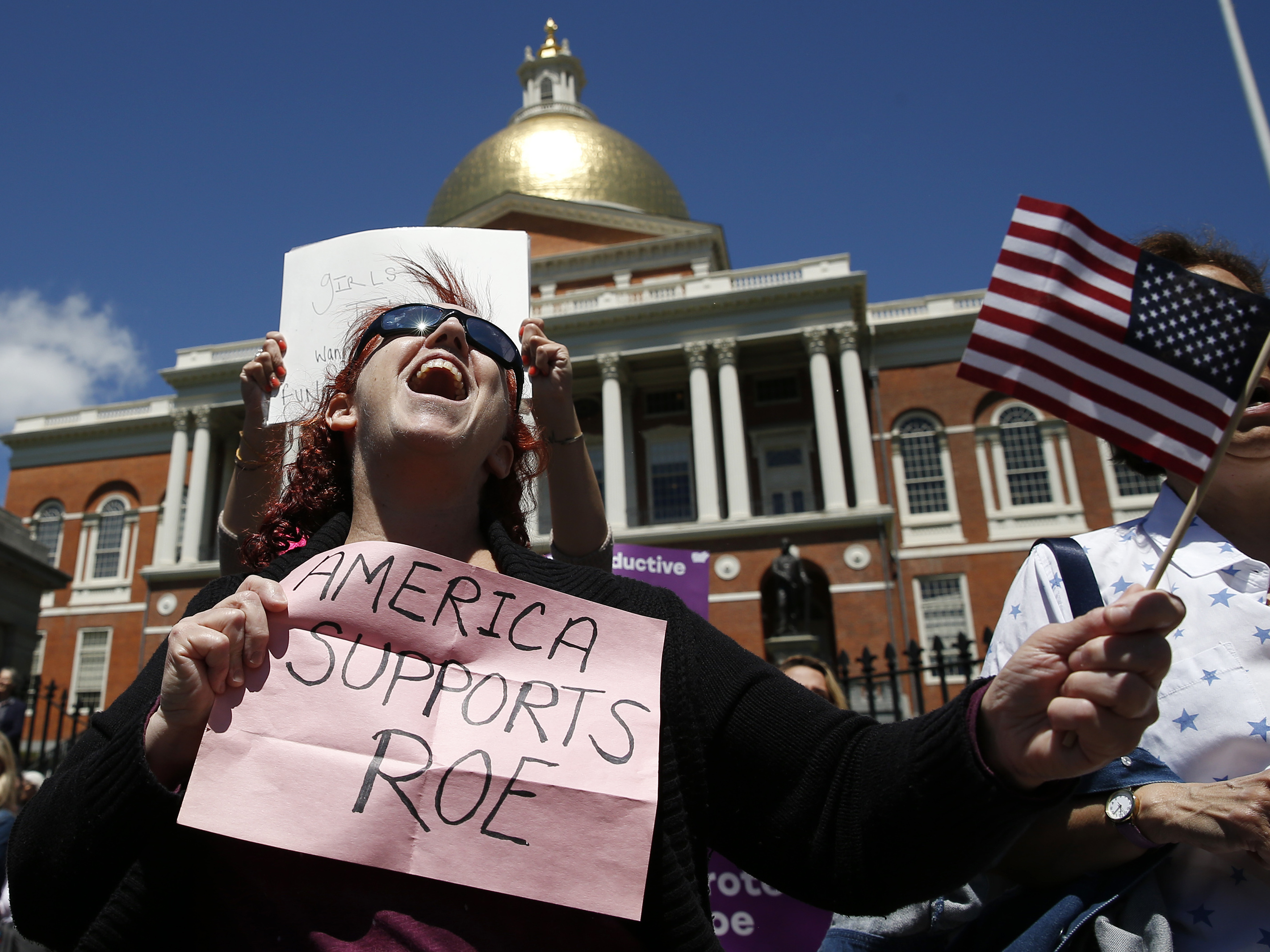 Women's rights activists, including Jane Marcus of Medford, pictured in May, have been urging the legislature to pass a law that codifies abortion rights in state law. (Boston Globe via Getty Images)