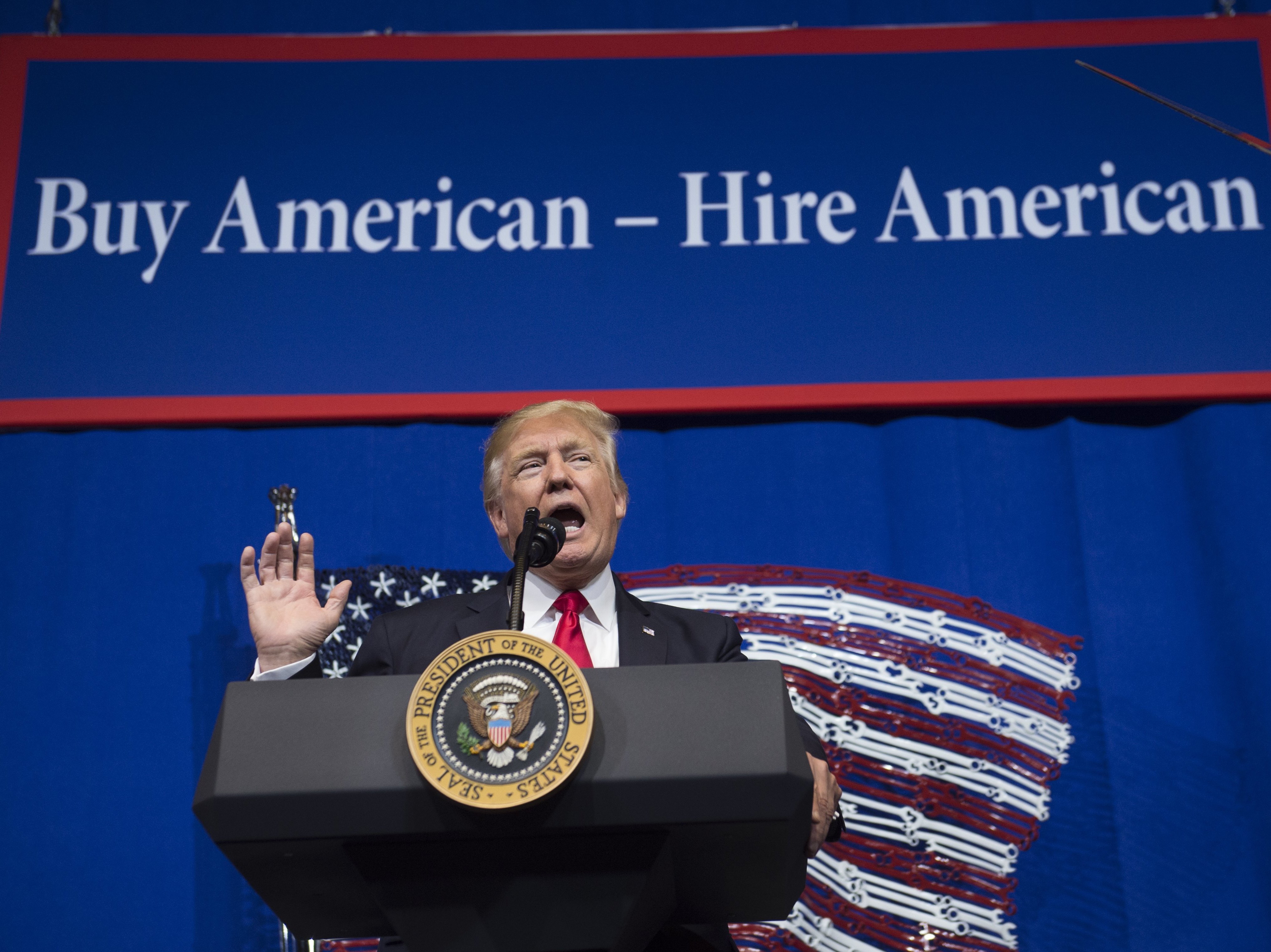 President Trump speaks before signing the &quot;Buy American, Hire American&quot; executive order in April 2017 in Kenosha, Wis. (AFP via Getty Images)