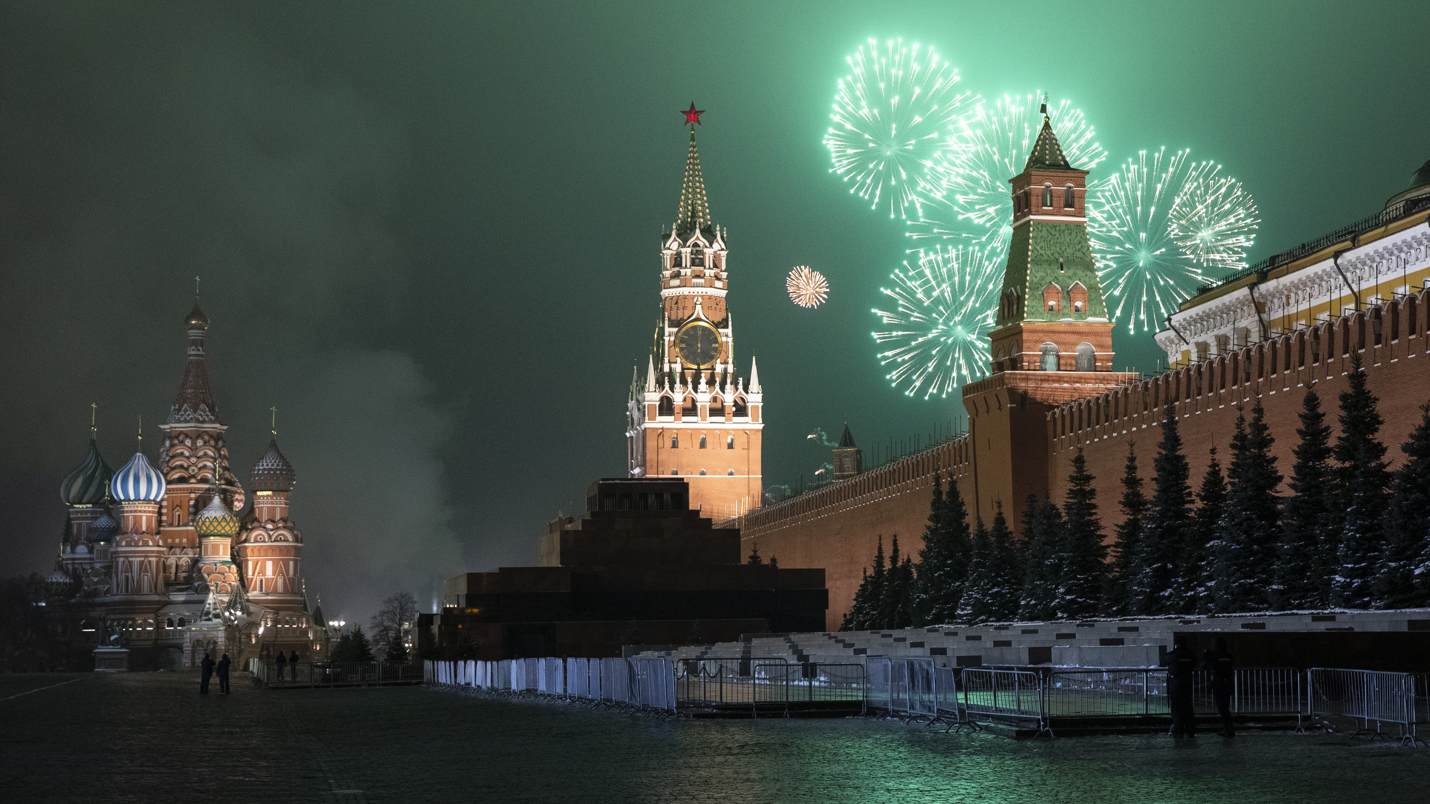 Fireworks explode over the Kremlin and Red Square during New Year