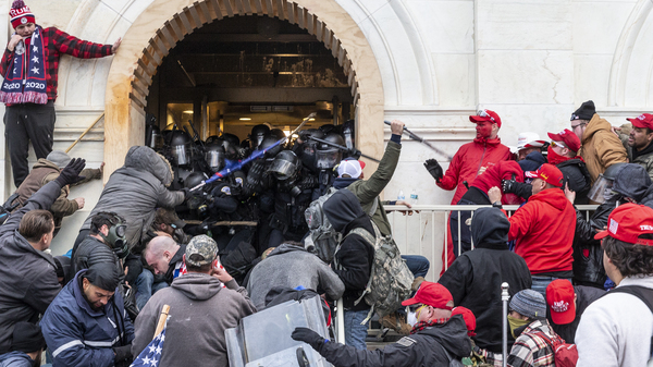 A mob of pro-Trump extremists clash with police as they try to enter the U.S. Capitol, hoping to overthrow the results of the 2020 election. Washington, D.C., Mayor Muriel Bowser calls the violent takeover of the Capitol building a case of "domestic terrorism."