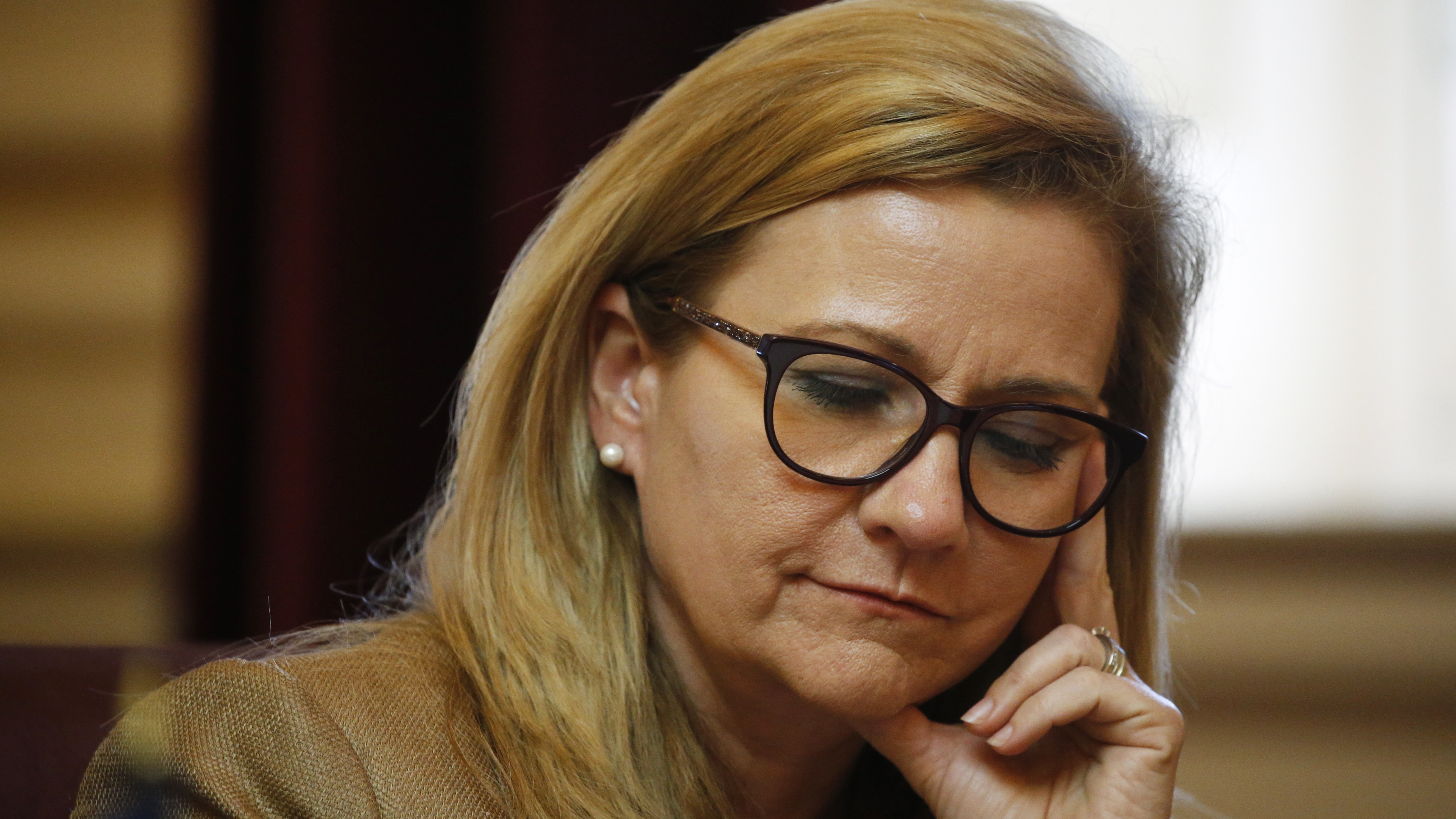 Virginia State Sen. Amanda Chase, a Republican, listens to debate during the Senate session at the Capitol Wednesday, Feb. 26, 2020, in Richmond, Va. Chase attended the rally in Washington D.C. in which rioters pushed their way into the U.S. Capitol.
