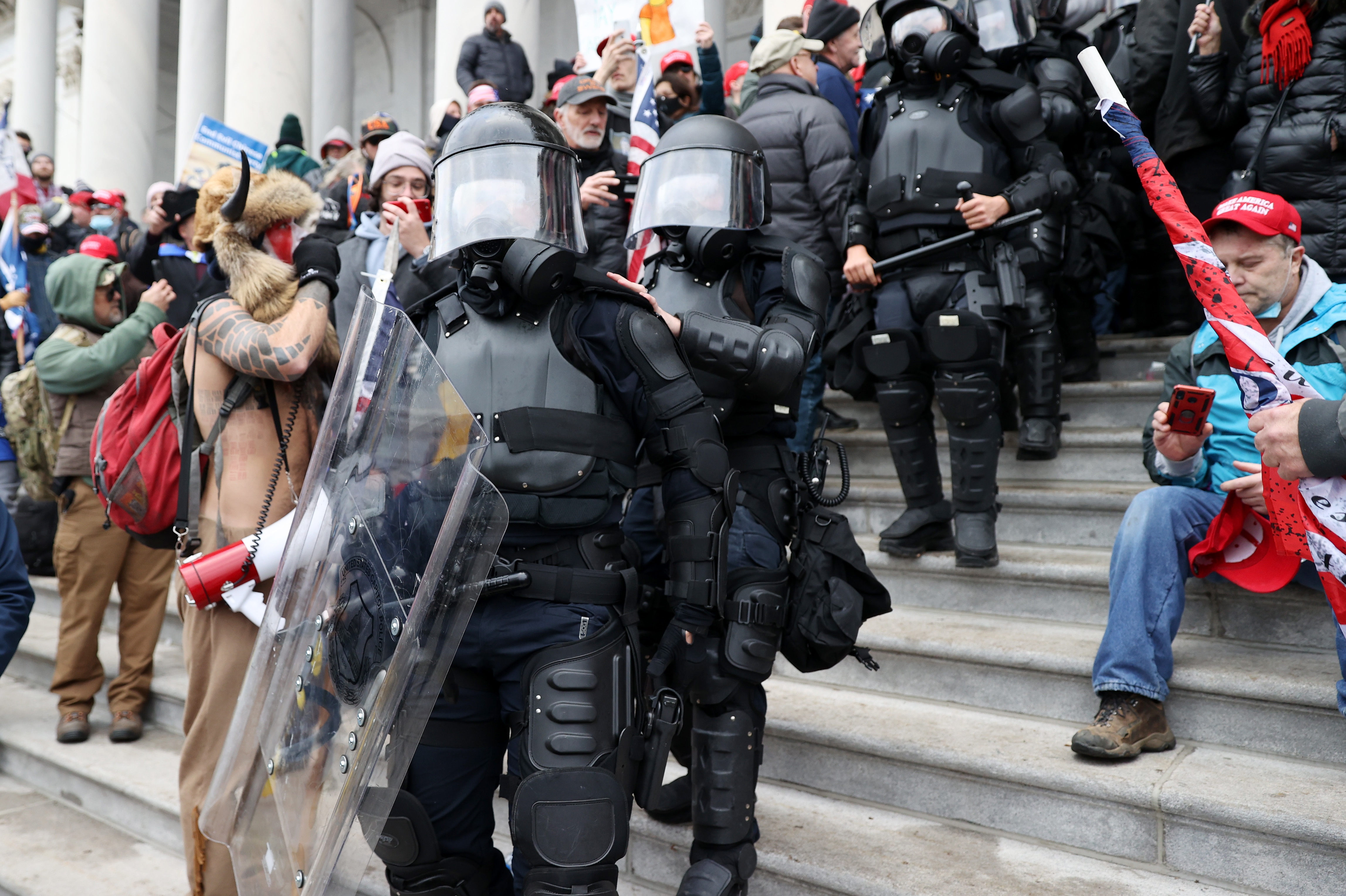 U.S. Capitol police officers make their way through pro-Trump extremists who stormed the Capitol building on Wednesday. (Getty Images)