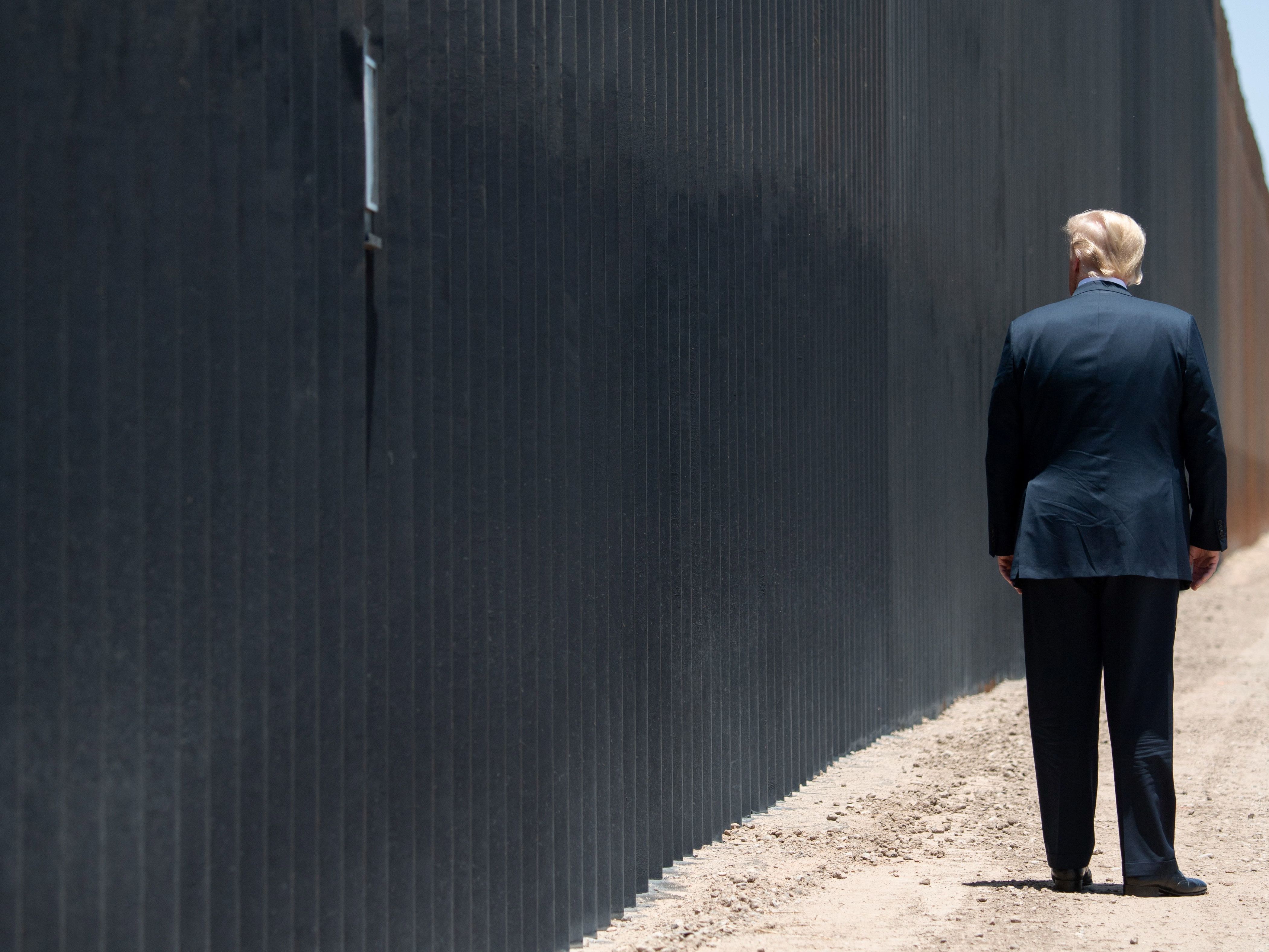 President Trump last visited the border wall — one of his signature election promises — in Arizona in June. (AFP via Getty Images)
