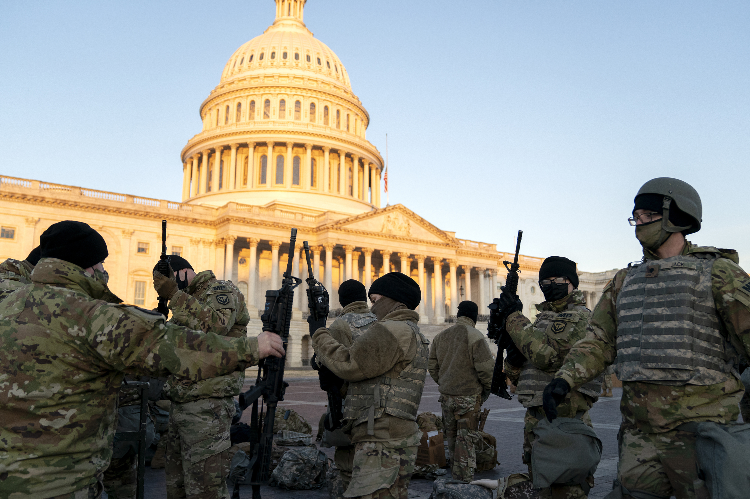 Weapons are distributed to members of the National Guard outside the U.S. Capitol on Wednesday. Security has been increased throughout Washington following the breach of the U.S. Capitol on Jan. 6, and leading up to the Presidential inauguration. (Getty Images)