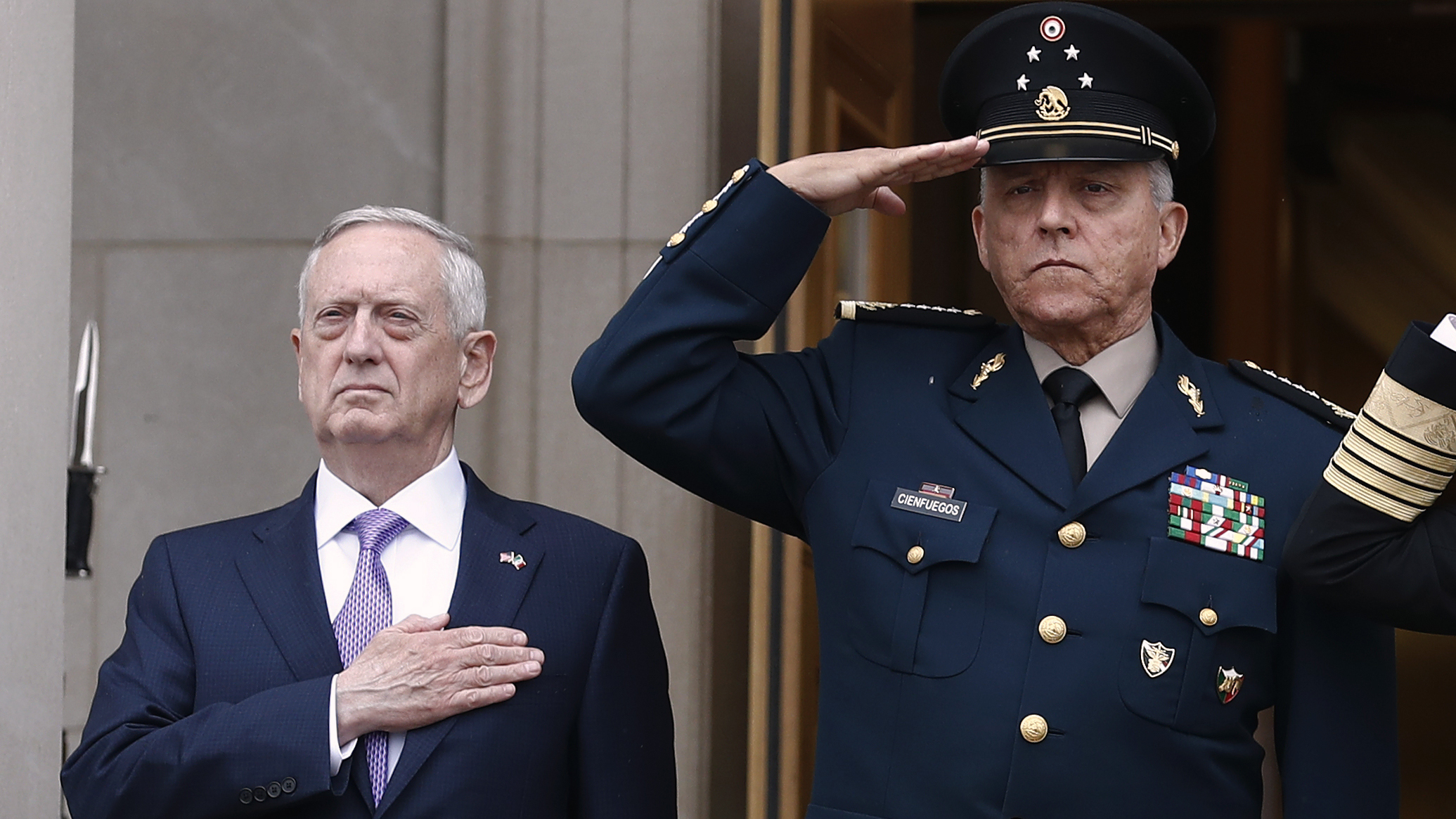 Former Defense Secretary Jim Mattis, left, and former Mexican Defense Secretary Gen. Salvador Cienfuegos Zepeda during an honor cordon at the Pentagon in 2017. Mexico cleared Cienfuegos of all charges related to drug trafficking on Thursday.
