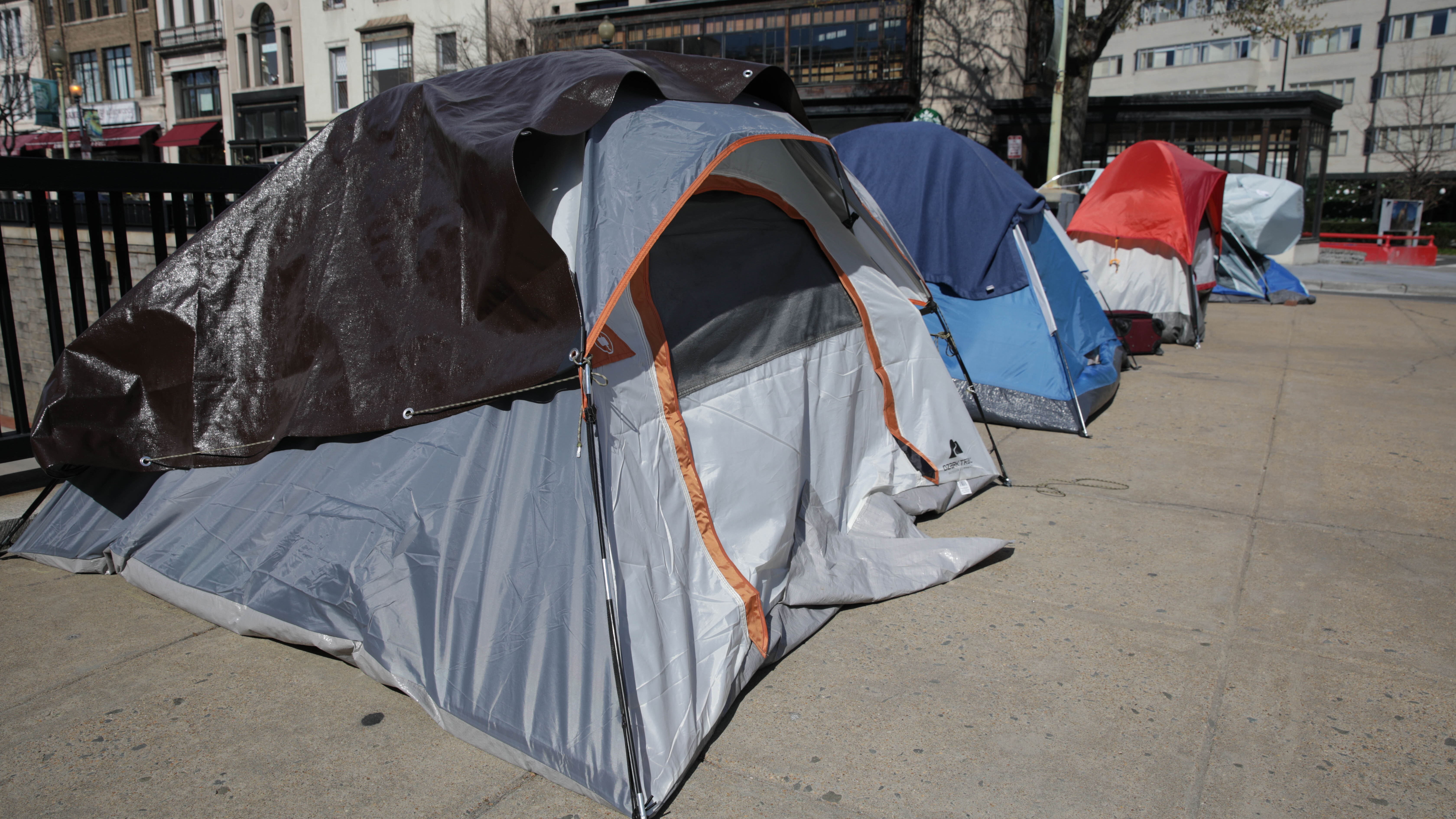 Tents of homeless people line a street in Washington, D.C., in April.