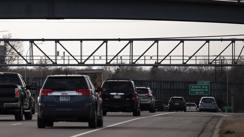 Vehicles drive on highway I-94 in St. Paul, Minn., on Nov. 7, 2020. A recent report from the International Energy Agency said emissions fell across most parts of the economy, with one notable exception: SUVs. (Stephen Maturen/Getty Images)
