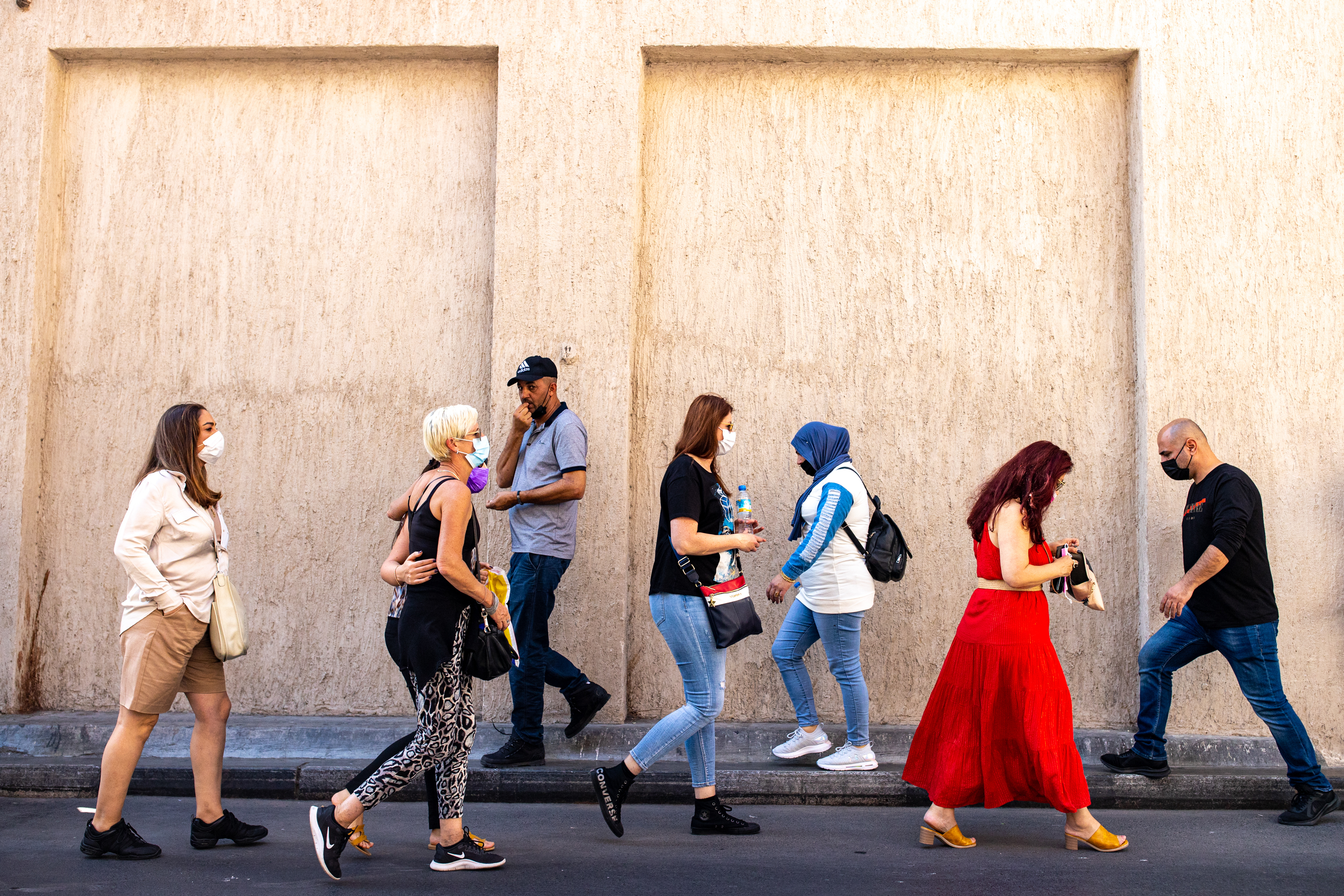 Israeli tourists walk through the Deira district near Dubai's grand souk in December. (Christopher Pike for NPR)
