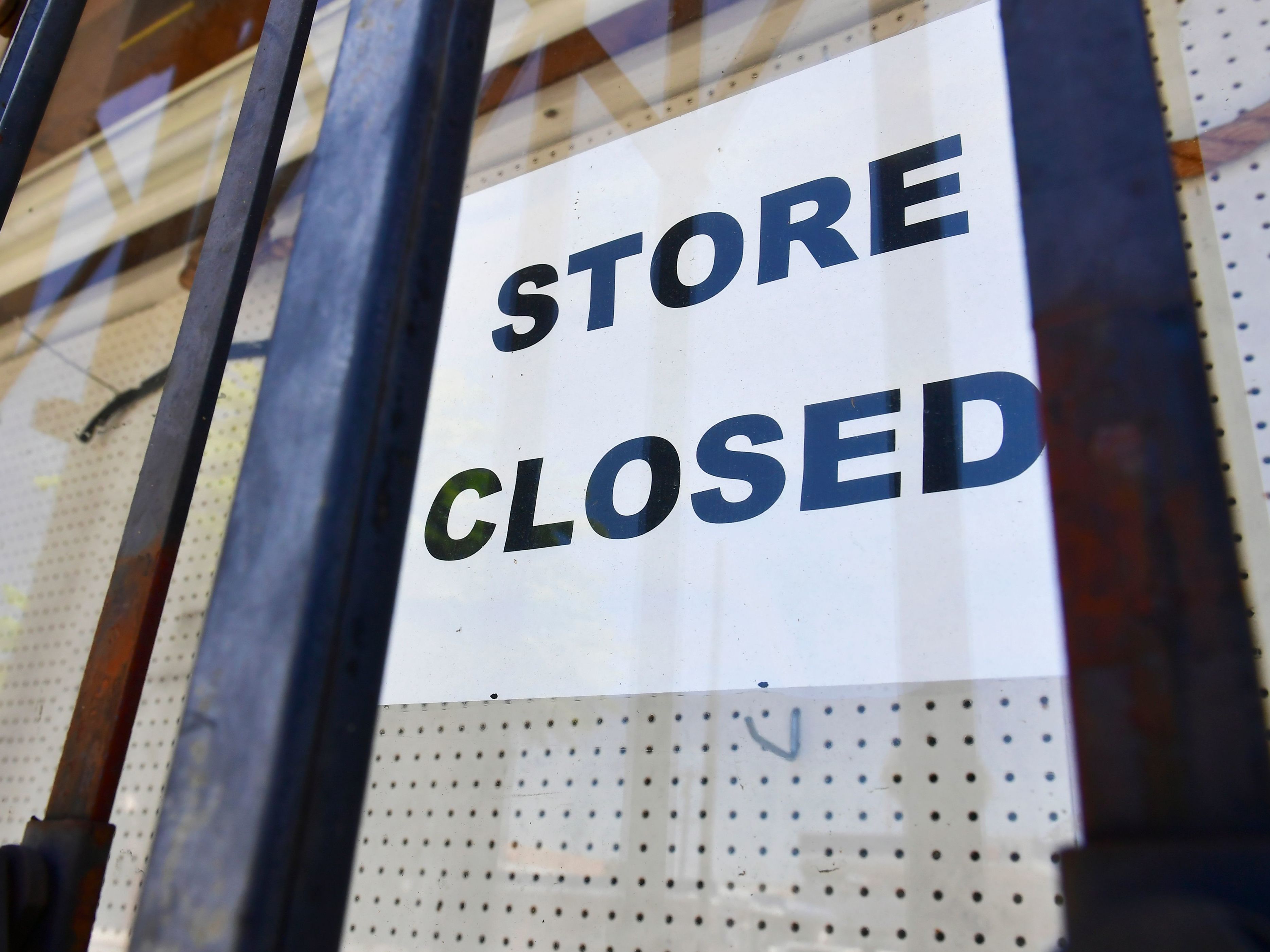 The U.S. economy slowed sharply in the last three months of the year from the previous quarter as the pandemic made a resurgence and businesses had to close. (AFP via Getty Images)