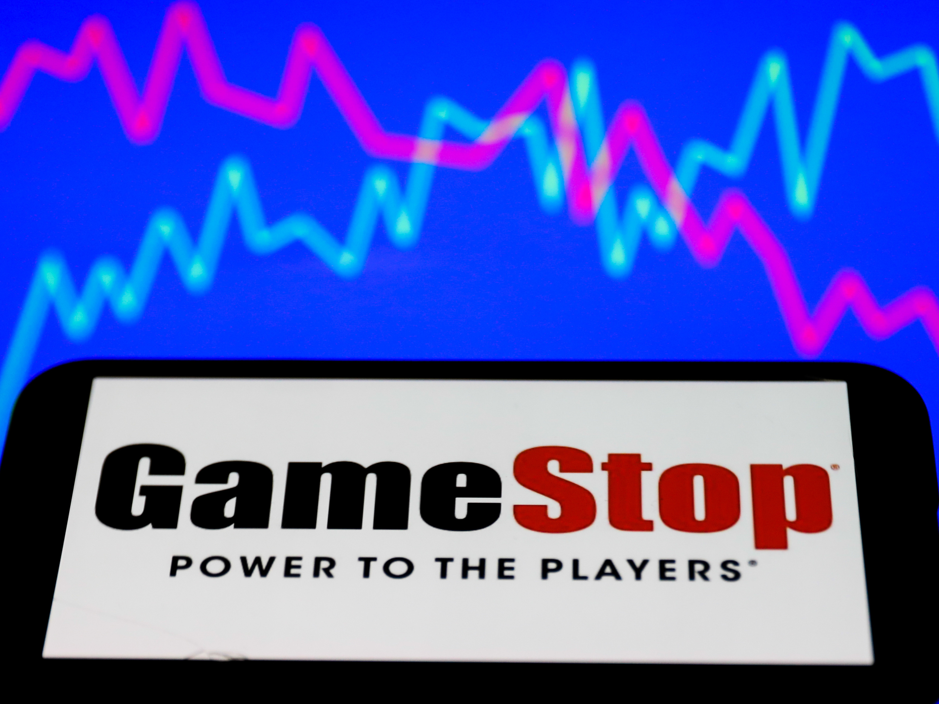 Shares of GameStop have surged as amateur investors foil hedge funds' efforts to short sell the stock. (NurPhoto via Getty Images)