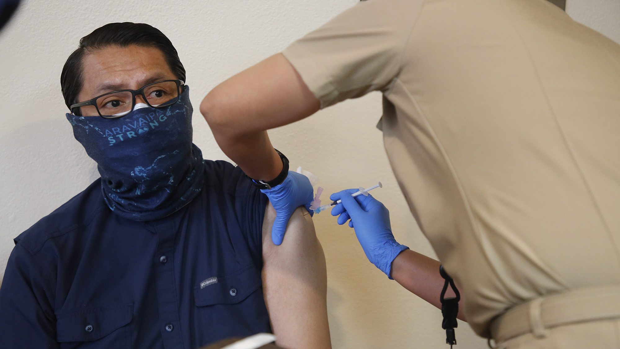 Navajo Nation President Jonathan Nez receives the Pfizer-BioNTech COVID-19 vaccine on Dec. 31, 2020 at Gallup Indian Medical Center in Gallup, N.M.