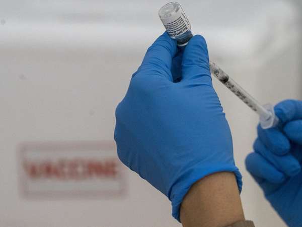 A dose of the Pfizer COVID-19 vaccine in New York, 2020. Johnson & Johnson is the third vaccine candidate to apply for emergency use authorization from the FDA. The vaccine requires a single dose and doesn't require ultra-cold temperatures for storage.