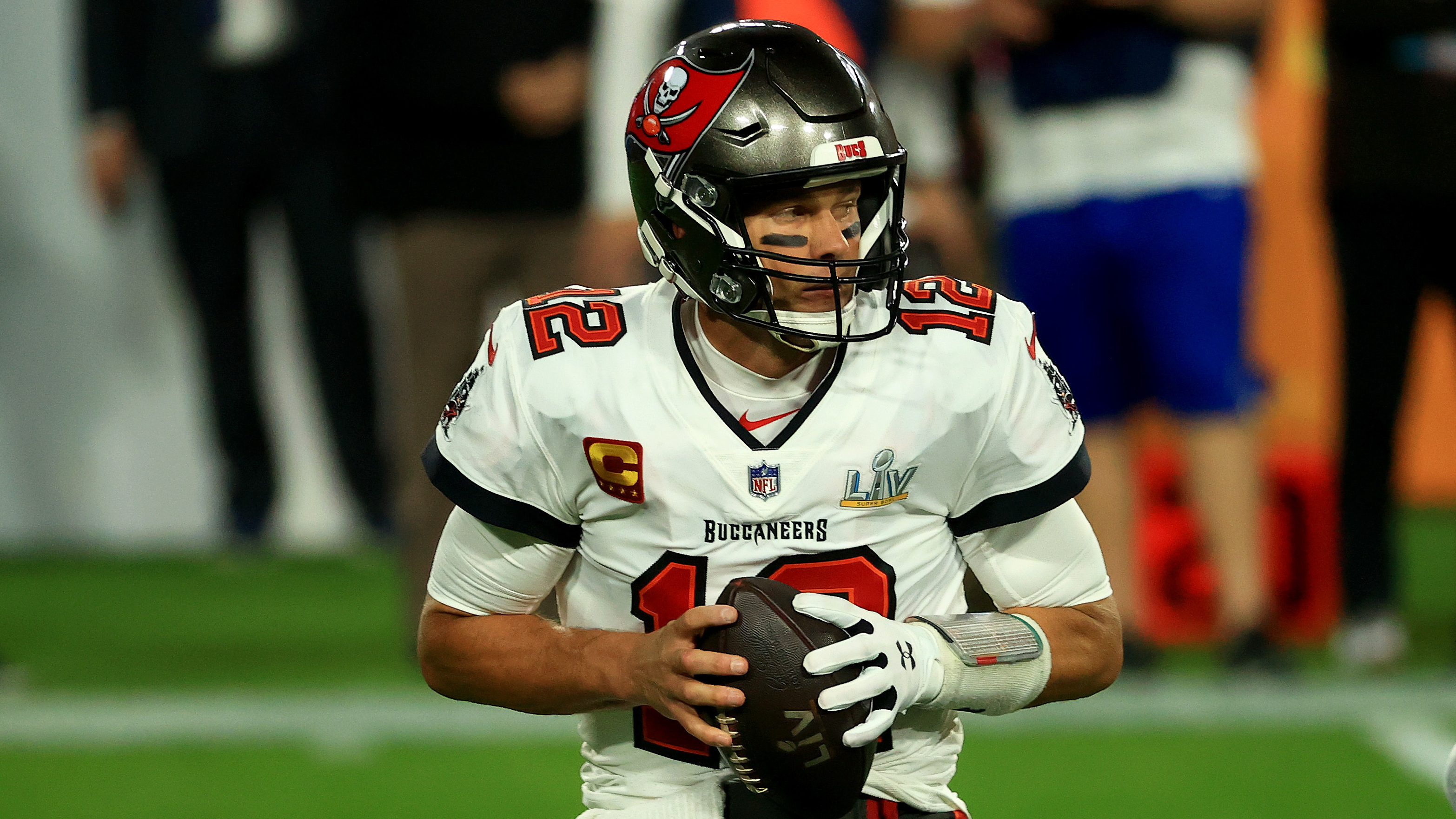 Tampa Bay quarterback Tom Brady scrambles during the first quarter.