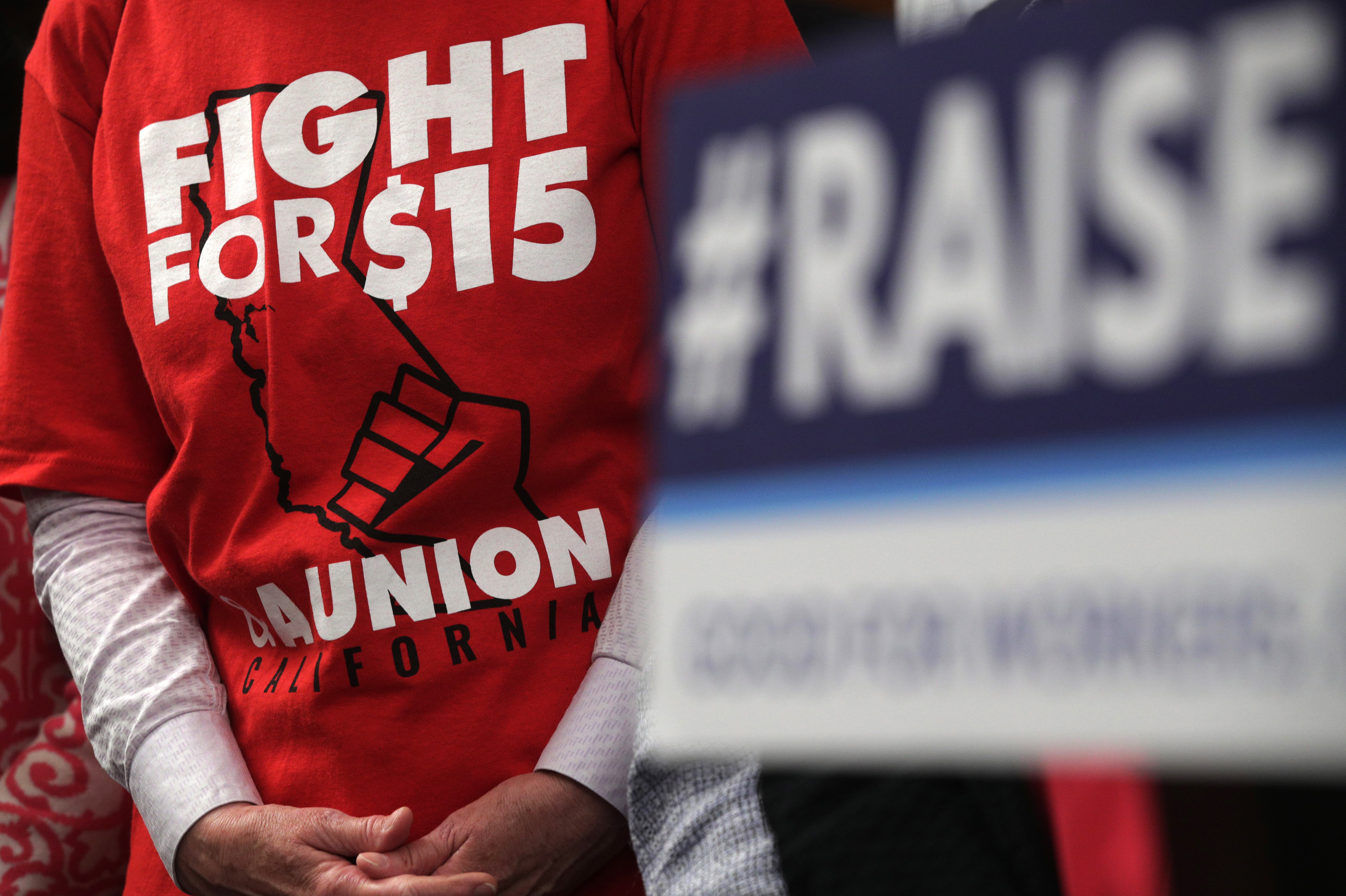 An activist wears a &quot;Fight For $15 and a Union&quot; t-shirt at the U.S. Capitol in 2019 as lawmakers took on legislation to raise the federal minimum wage. (Getty Images)