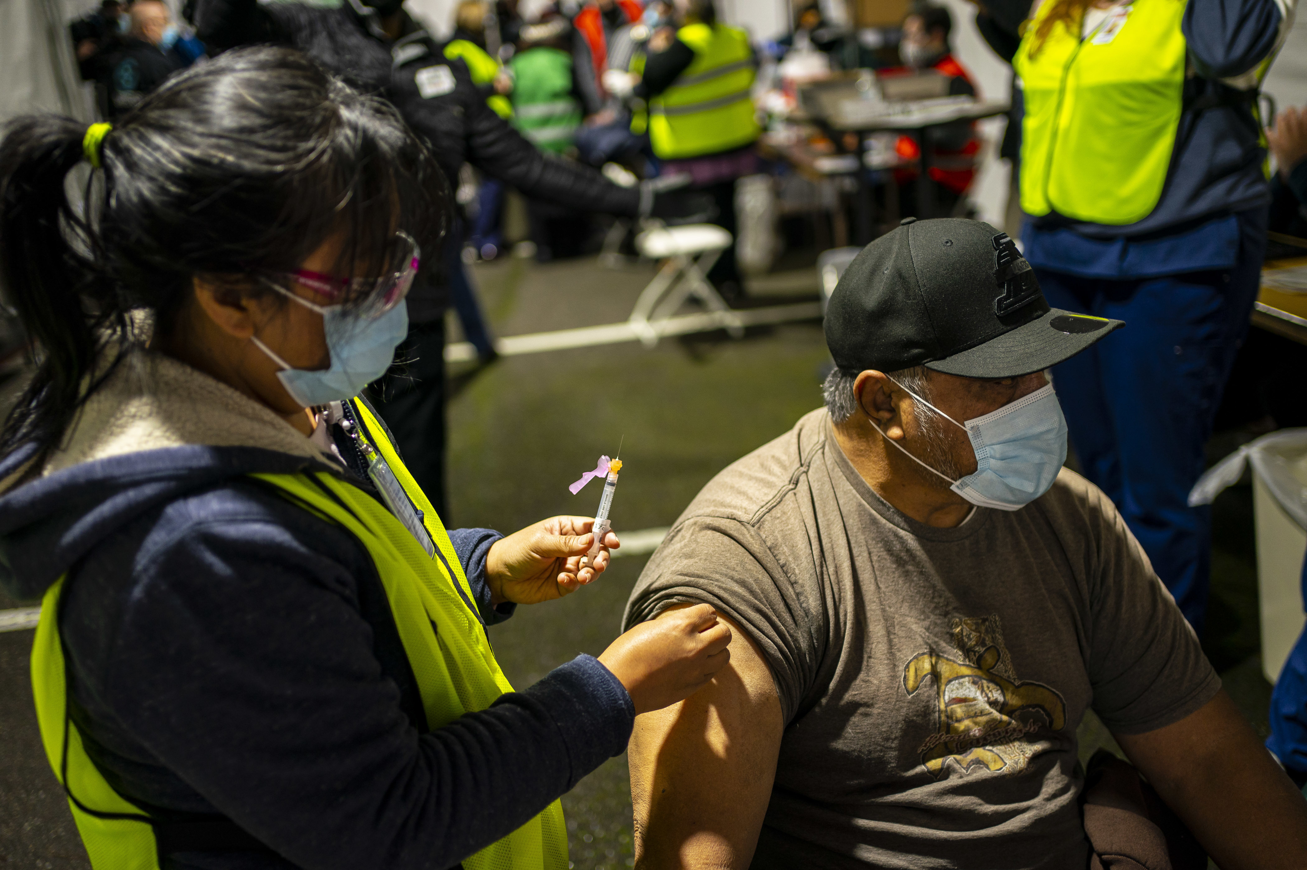 A person receives a COVID-19 shot in Federal Way, Wash., at a vaccination clinic for the Pacific Islander Community Association of Washington held on Feb. 4. (Getty Images)