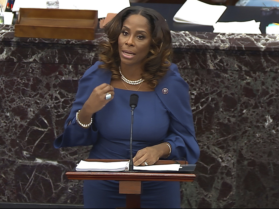 House impeachment manager Del. Stacey Plaskett, D-Virgin Islands, drew a stark comparison between the Americans who "sacrificed their lives for love of country, honor, duty" by stopping foreign terrorists from striking the Capitol on 9/11, and the insurgents who were "incited" by Trump to attack the seat of government. (Handout photo provided by Senate television/AP)