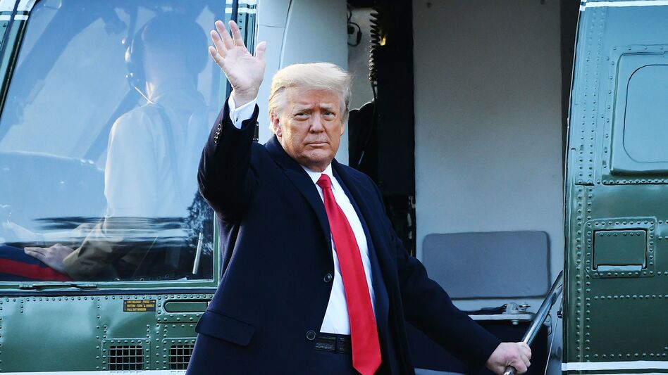 Outgoing President Donald Trump waves as he boards Marine One to leave the White House on Jan 20. Trump is now in Florida, observing his second impeachment trial from afar. (Mandel Ngan/AFP via Getty Images)
