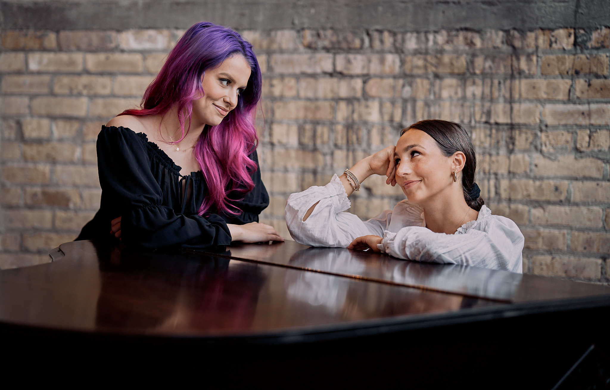 Abigail Barlow, left, and Emily Bear are the creative duo behind <em>Bridgerton</em> the musical. &quot;We wanted to be able to tell a stand-alone story and still honor what was created in the books and the TV show,&quot; says Barlow. &quot;But honestly, we want to bring something new to these characters as well.&quot; (Igor Kasyanyuk)