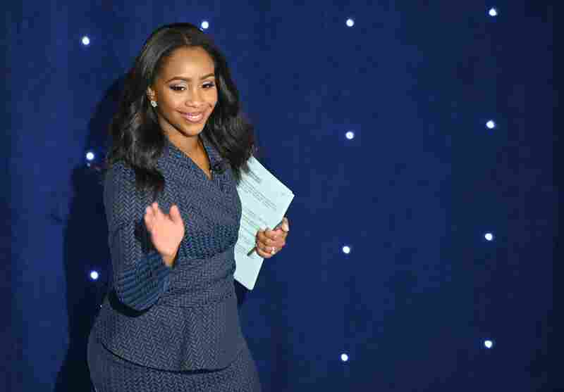 CNN White House correspondent Abby Phillip arrives on stage to moderate the seventh Democratic primary debate of the 2020 presidential campaign season at the Drake University campus in Des Moines, Iowa, on Jan. 14, 2020.