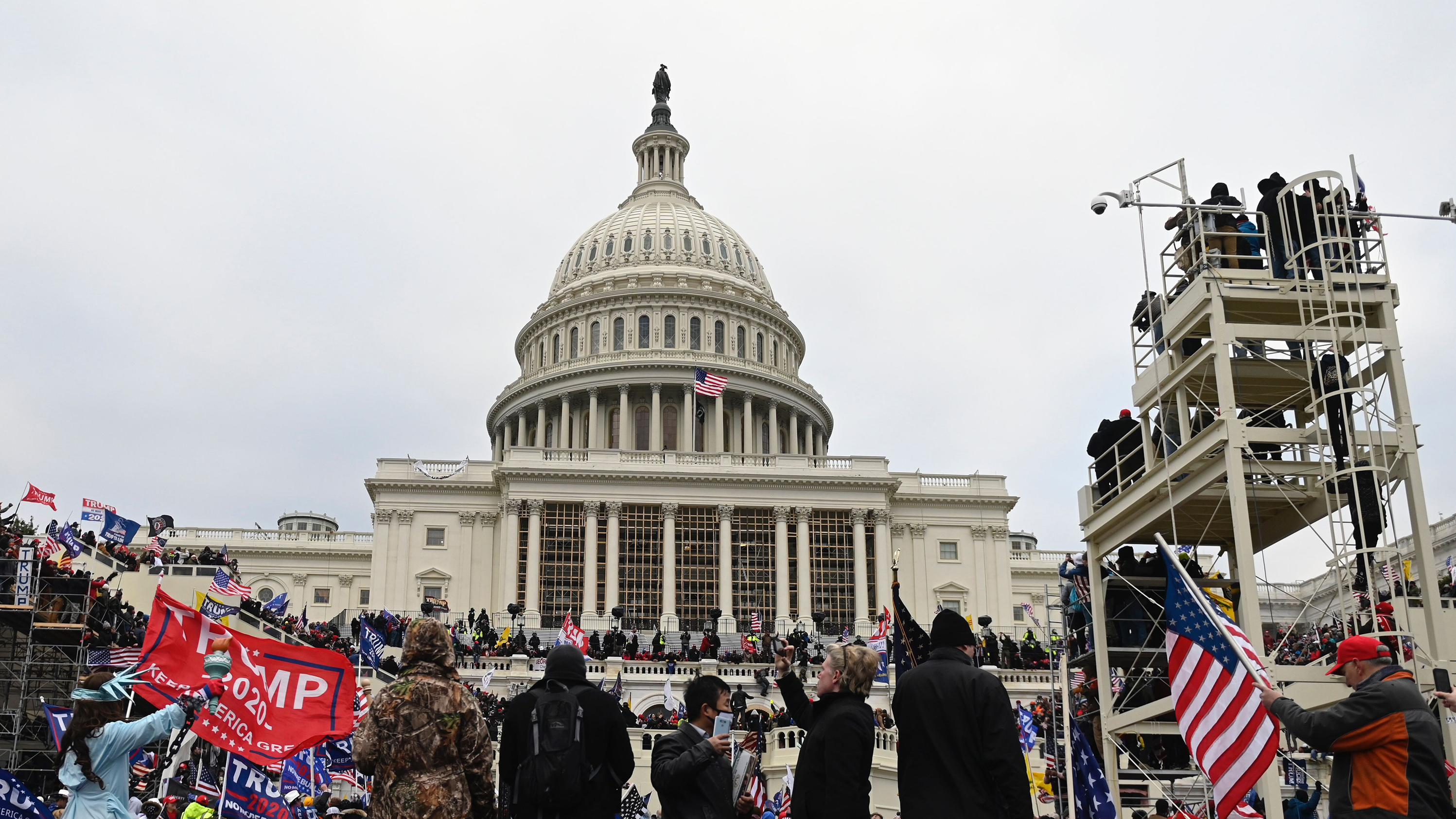 A mob of former President Donald Trump supporters breached the U.S Capitol security on Jan. 6. (AFP via Getty Images)