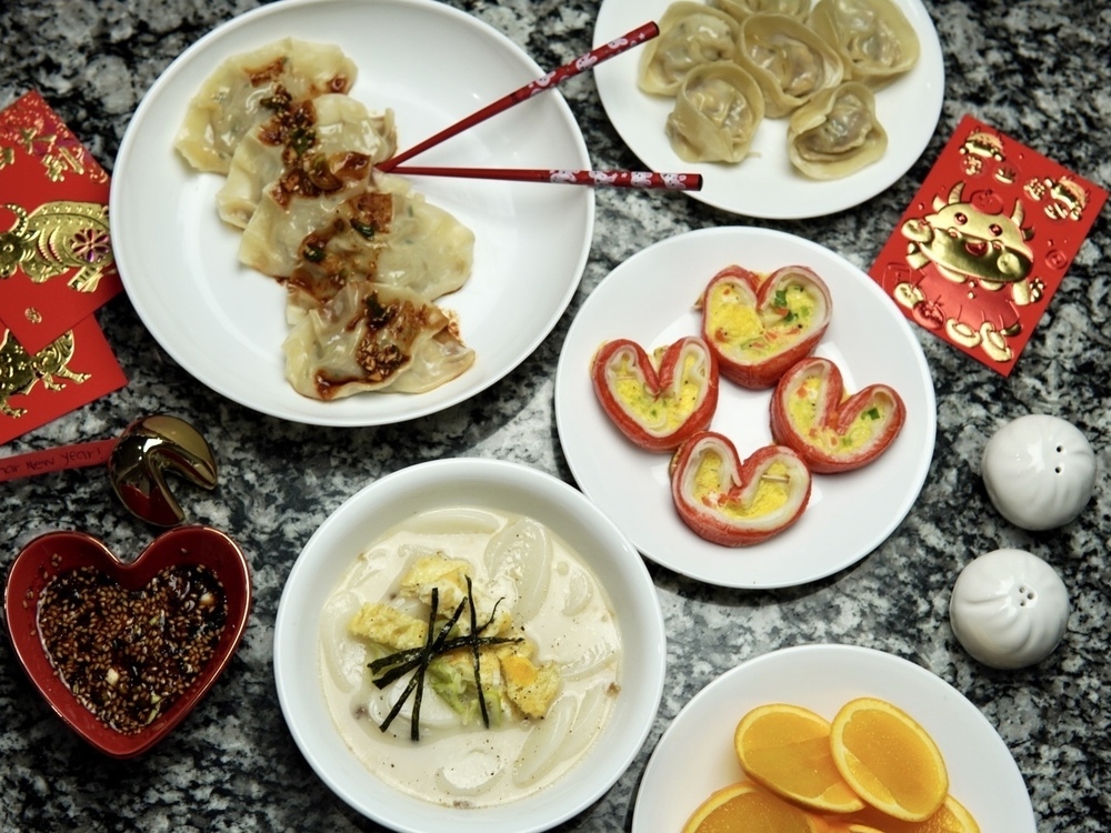 Lunar New Year meal prepared by Jessica Woo. <em>Mandus</em> (top), imitation crab <em>jeon</em> (center) and <em>tteokguk</em> (bottom). (Courtesy of Jessica Woo)