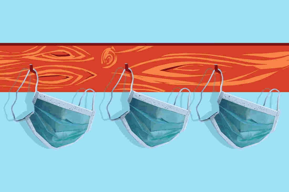Illustration of face protective masks hanging on a coat rack.