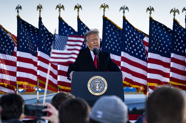 Former President Donald Trump, seen here speaking to supporters on Jan. 20, attacked Senate Minority Leader Mitch McConnell in a statement Tuesday evening.