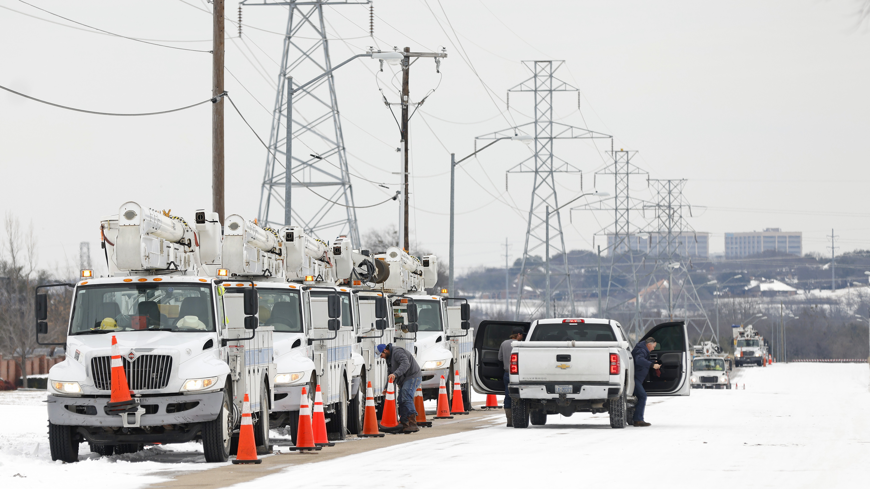 Pike Electric service trucks line up after a snowstorm on Tuesday in Fort Worth, Texas. Millions across the state have been without power, water or both, following historic low temperatures brought by winter weather. (Getty Images)